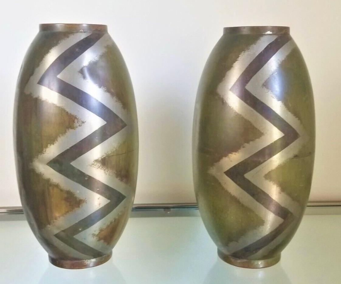 Dinanderie Art Deco Pair of Vases Series Evolution by Paul Mergier. Engraved with Evolution mark of descending triangles each numbered as a set 365/1805 each inlaid with linear and geometric motifs. Attributed to Paul Louis Mergier (1891-1986) who
