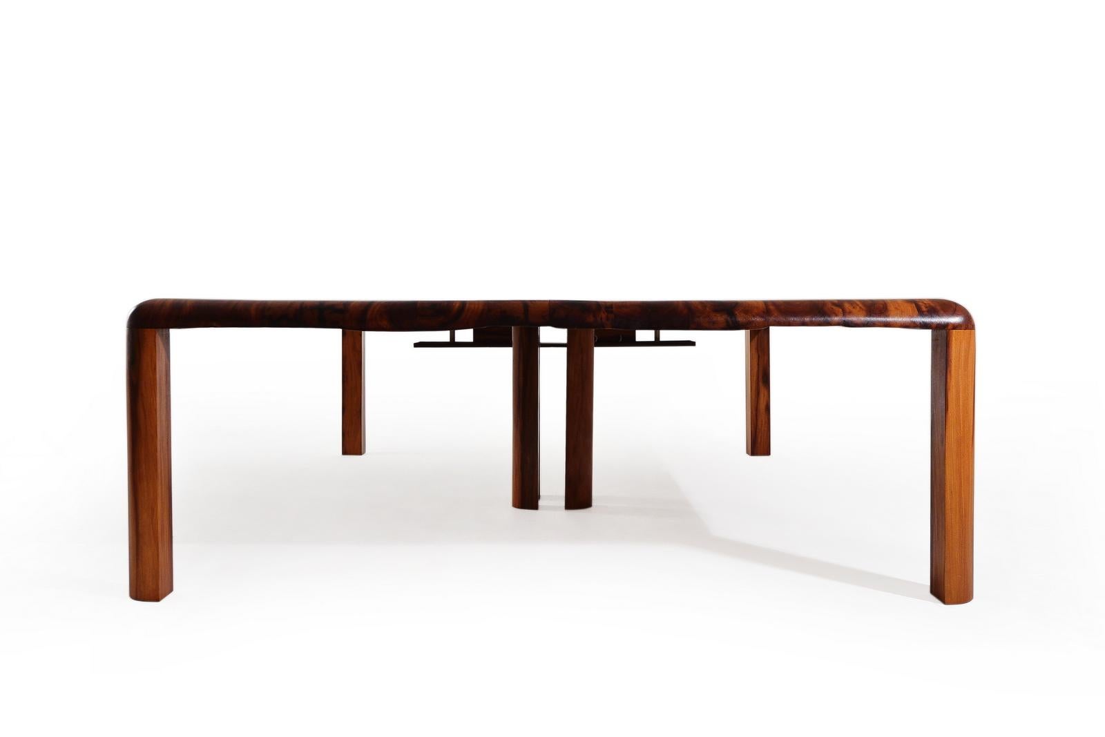 Custom made table with reclaimed red wood, by P. Tendercool.
 
We needed a new desk/meeting table for our office and were inspired by a recent bespoke design we created for a long-time friend and client. Reversed beveled edge mounted on rounded