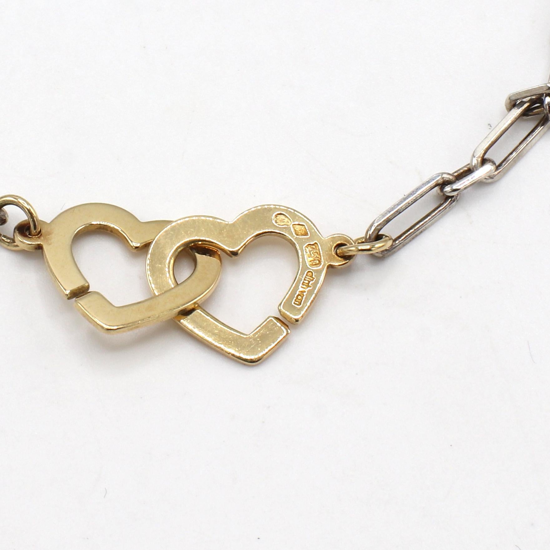 Dinh Van 18K Gold & Sterling Silver Double Heart Chain Link Bracelet

Metal: 18k yellow gold & sterling silver 
Weight: 6.35 grams
Length: 8.25