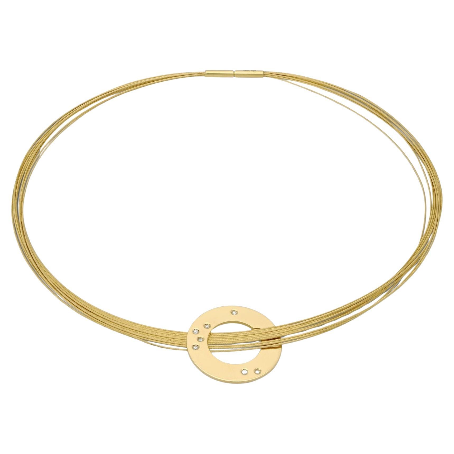 Collana Dinh Van in oro 18 ct con ciondolo a forma di disco incastonato di diamanti Circa 2000 in vendita