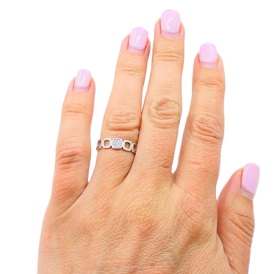DESIGNER: Jean Dinh Van
CIRCA: 1970s
MATERIALS: 18k Gold
GEMSTONE: Diamond 
WEIGHT: 2.3 Grams
MEASUREMENTS: 3/16