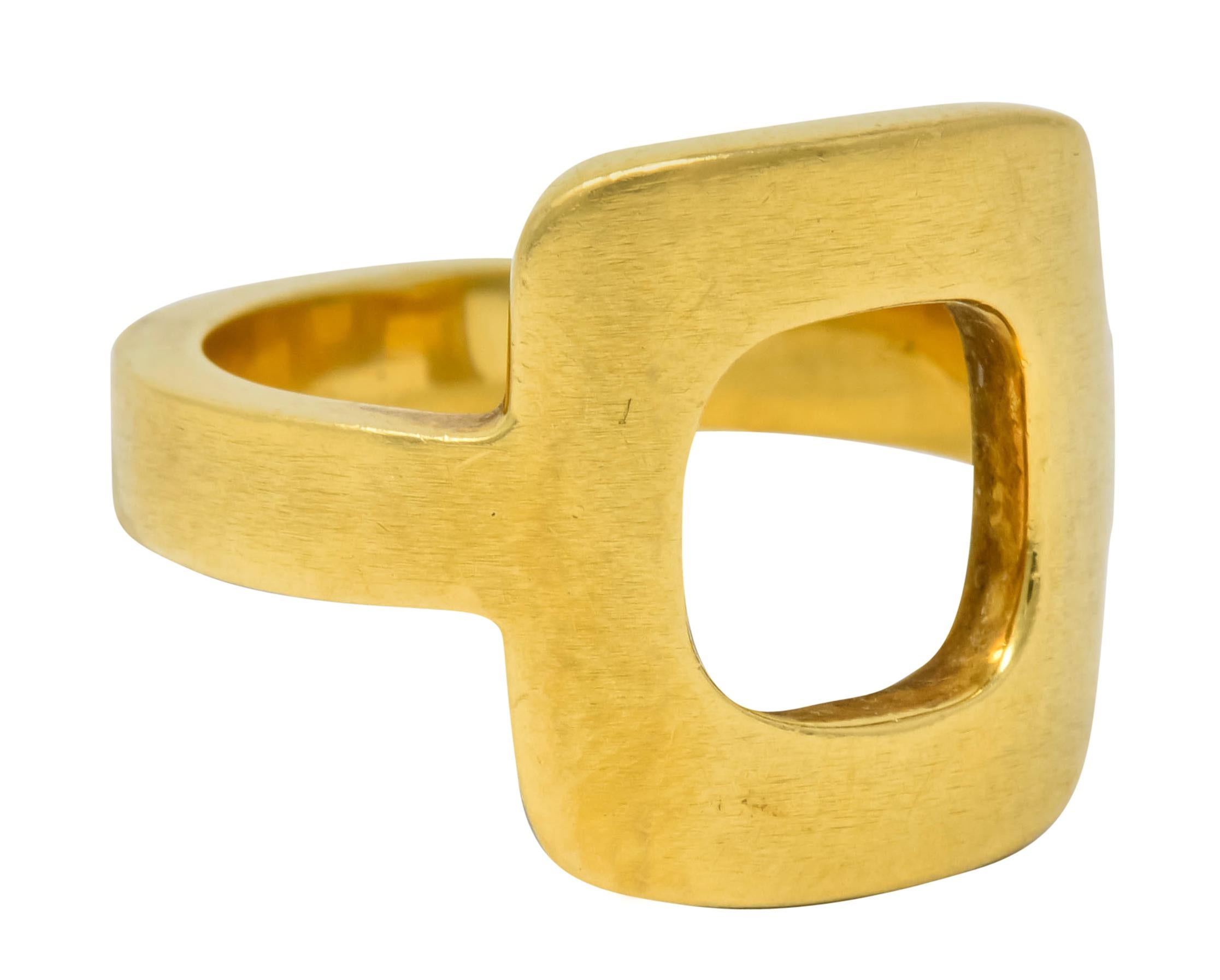 Ring designed as cushioned square with a pierced out center

Features a subtle satin finish

Fully signed Dinh Van, Cartier, and numbered

Stamped 18K for 18 karat gold

Circa: 1960s

Ring Size: 6 & sizable

Top measures: 15.7 mm and sits 2.3 mm