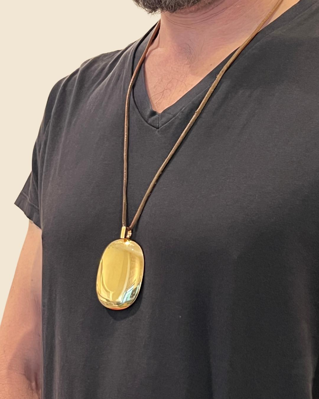 Women's or Men's Dinh Van for Cartier 18K Gold Pendant Necklace on a Leather Cord, c. 1970