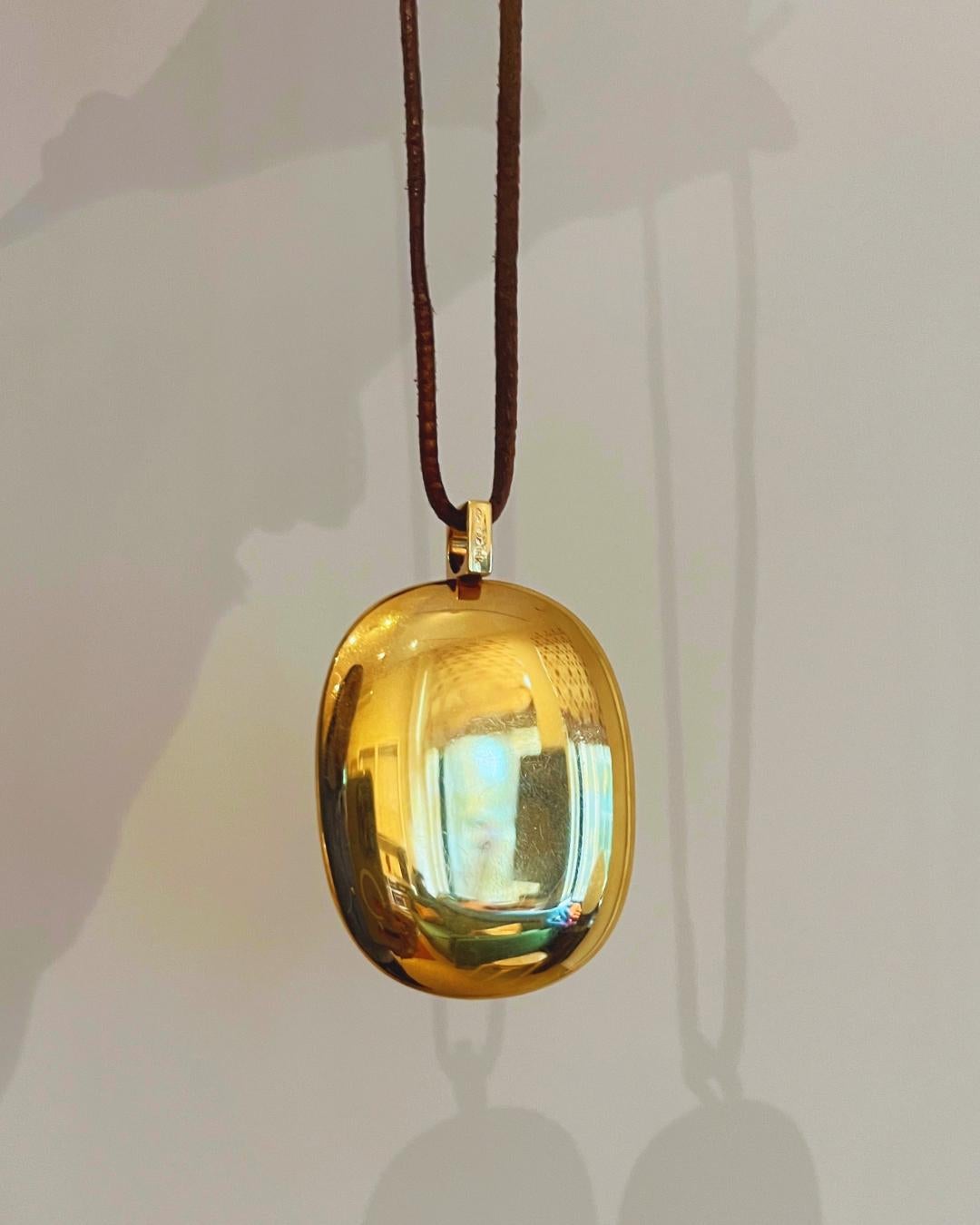 Dinh Van for Cartier 18K Gold Pendant Necklace on a Leather Cord, c. 1970 1