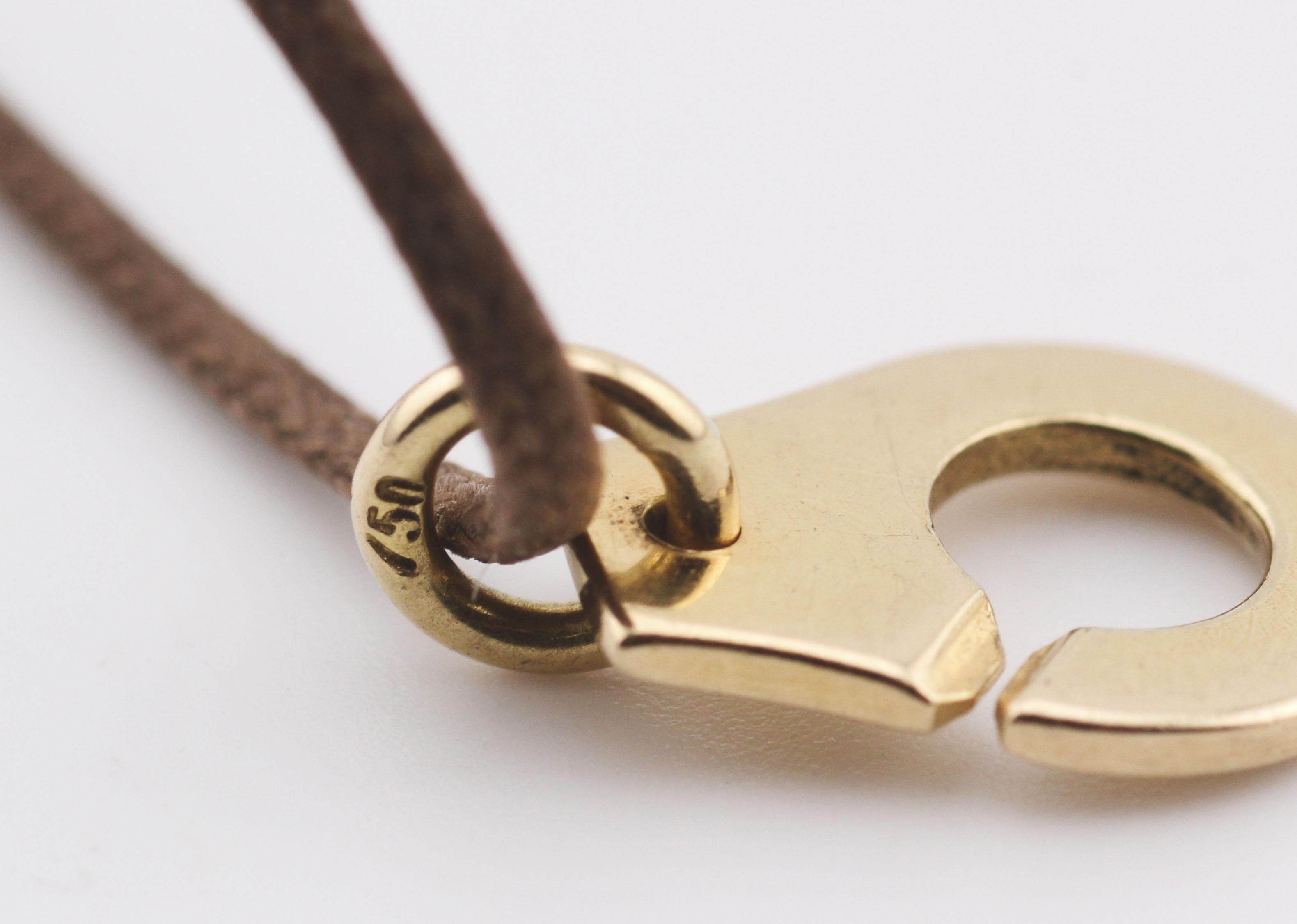 Dinh Van Menotte Handcuff 18k Yellow Gold Cord Bracelet For Sale 1