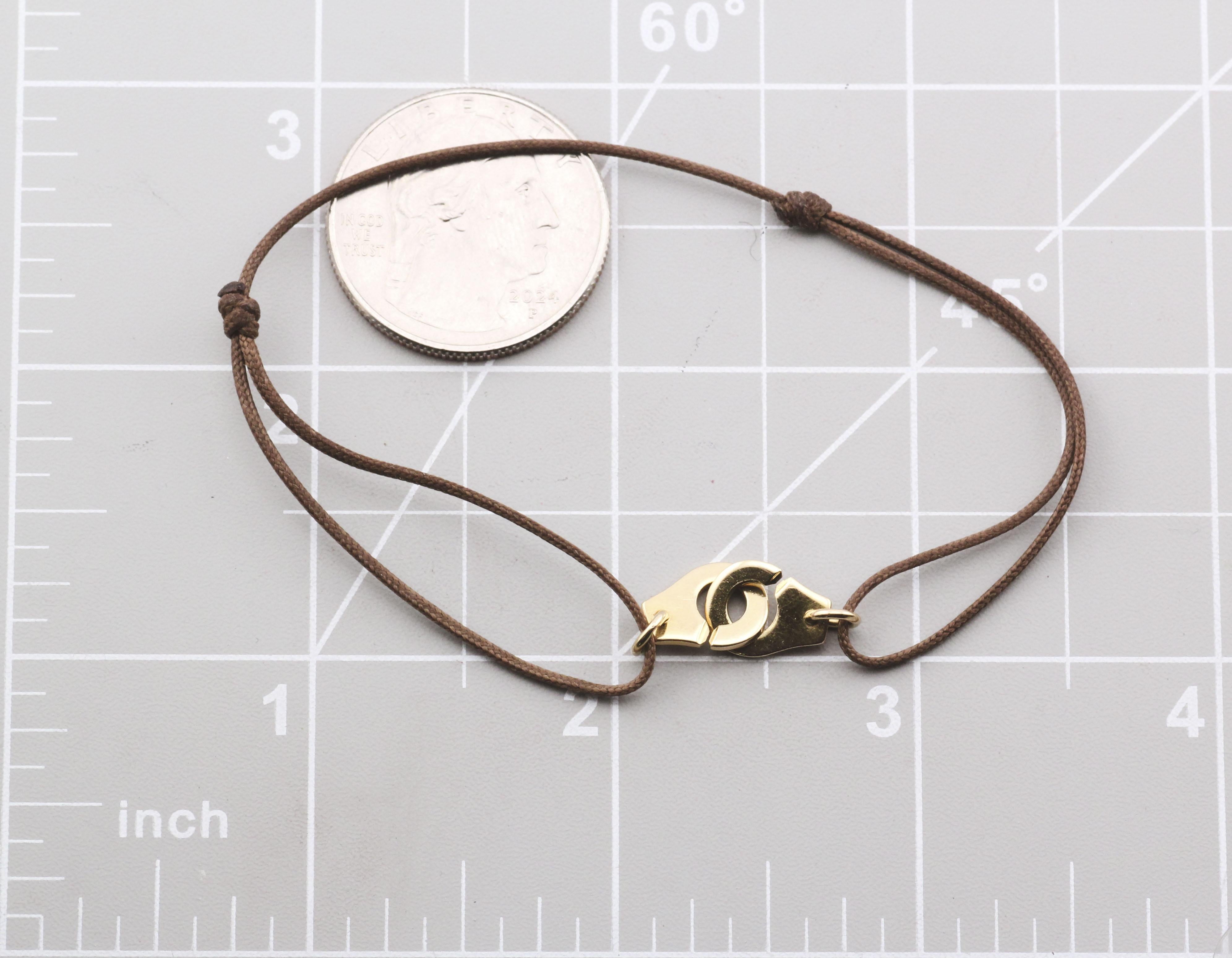 Dinh Van Menotte Handcuff 18k Yellow Gold Cord Bracelet For Sale 2