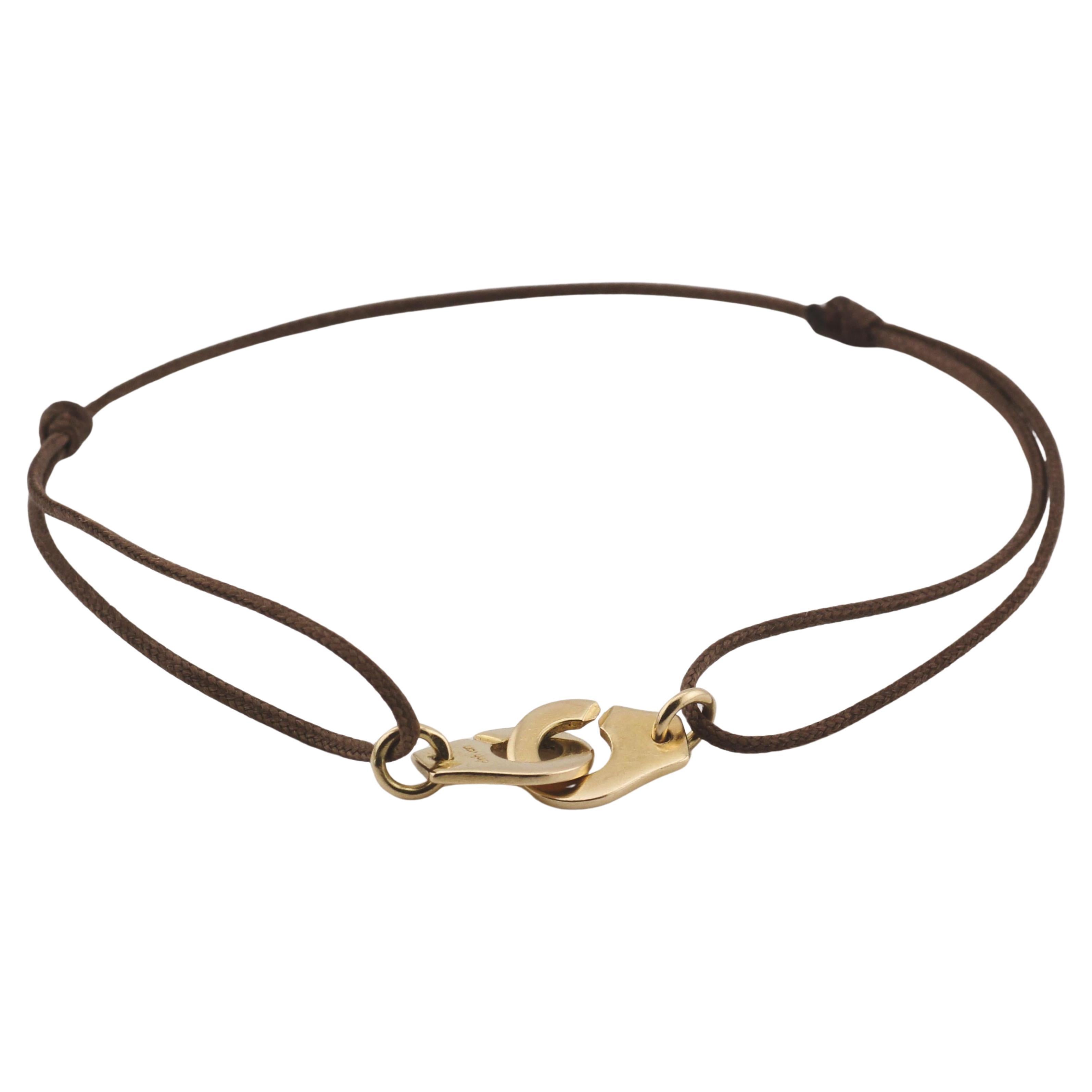 Dinh Van Menotte Handcuff 18k Yellow Gold Cord Bracelet For Sale