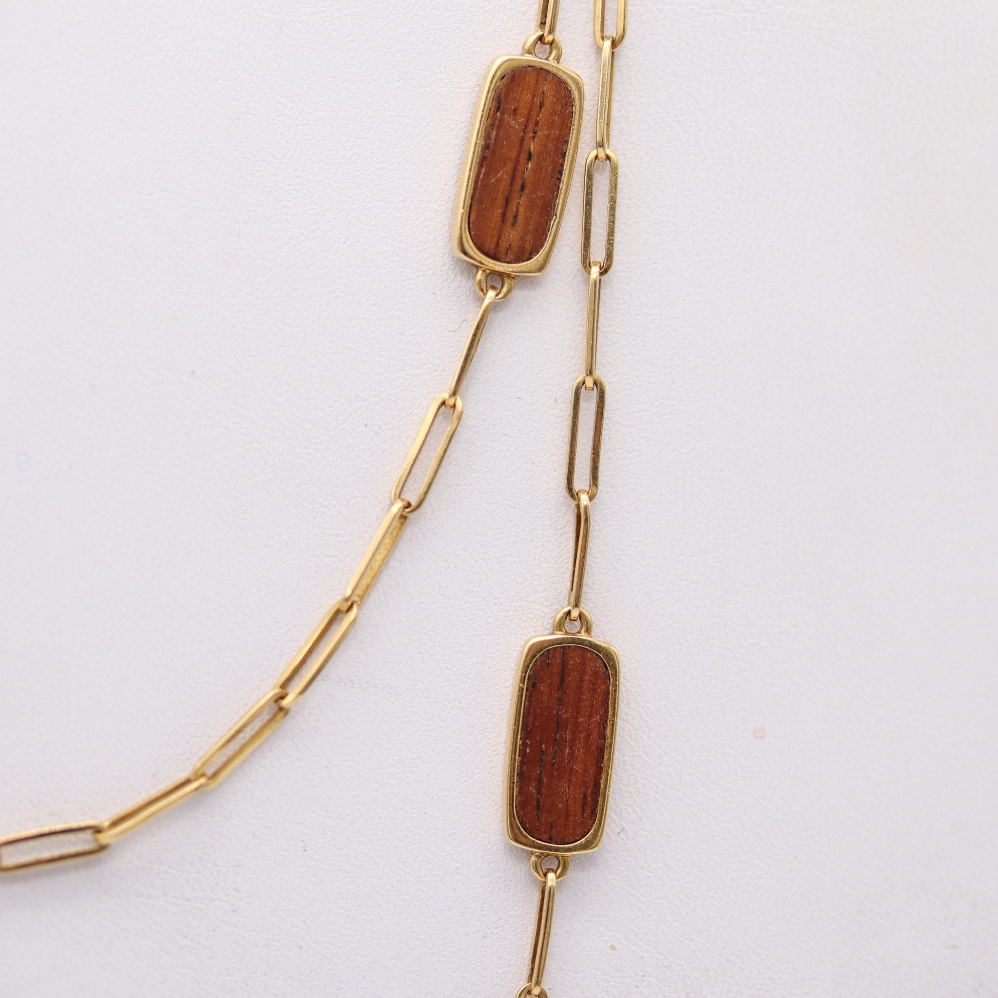 Wood sautoir necklace designed by Jean Dinh Van.

This is a very rare and sophisticated design, created in Paris France by the artist and jewelry designer Jean Dinh Van, back in the 1970's. This long necklace sautoir-type has been crafted in solid