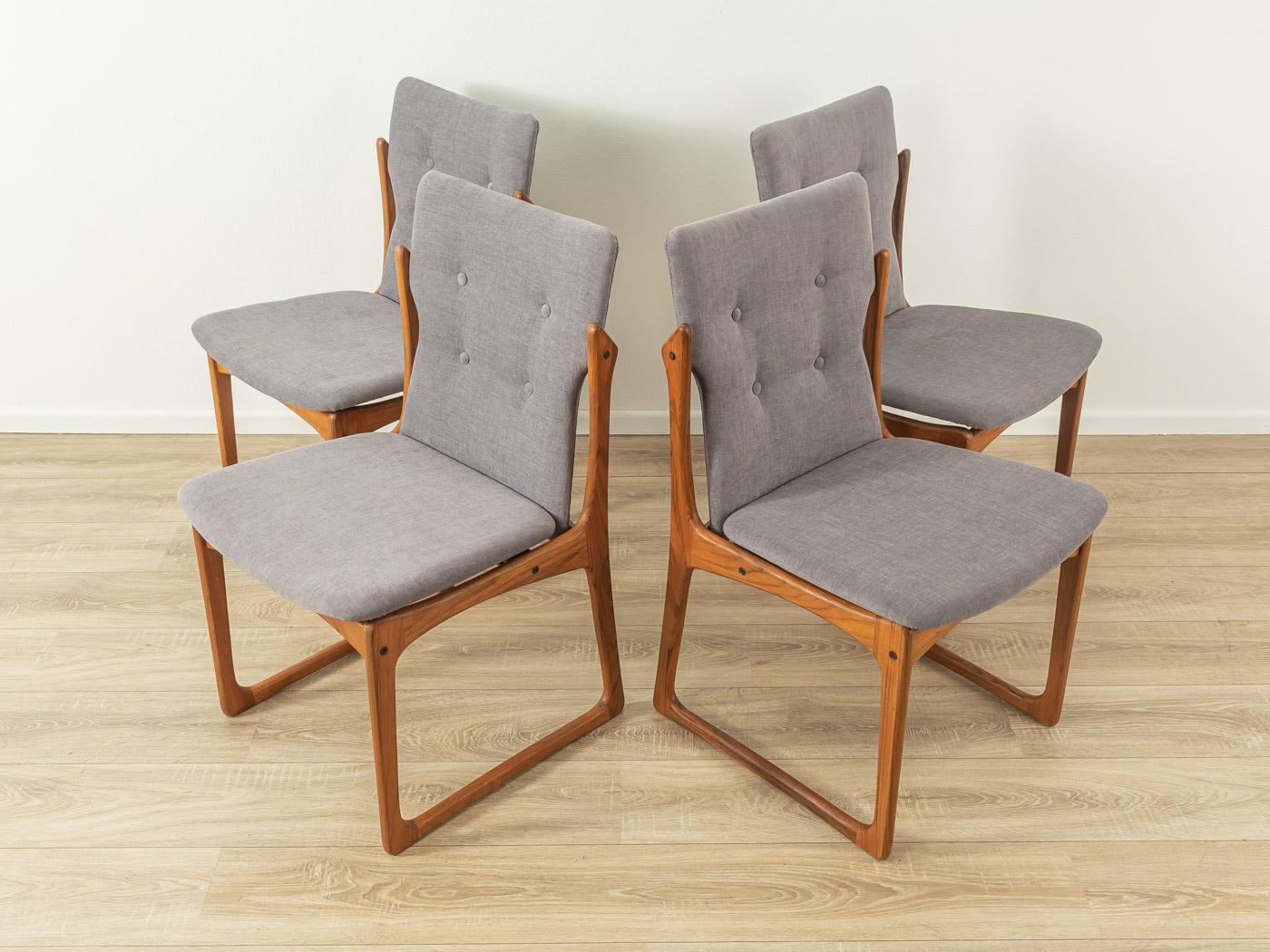 Classic dining chairs from the 1960s. High quality solid wood frame in teak. The chairs have been reupholstered and covered with a high-quality fabric in grey. The offer includes four chairs.
Quality Features:

 Accomplished design: perfect