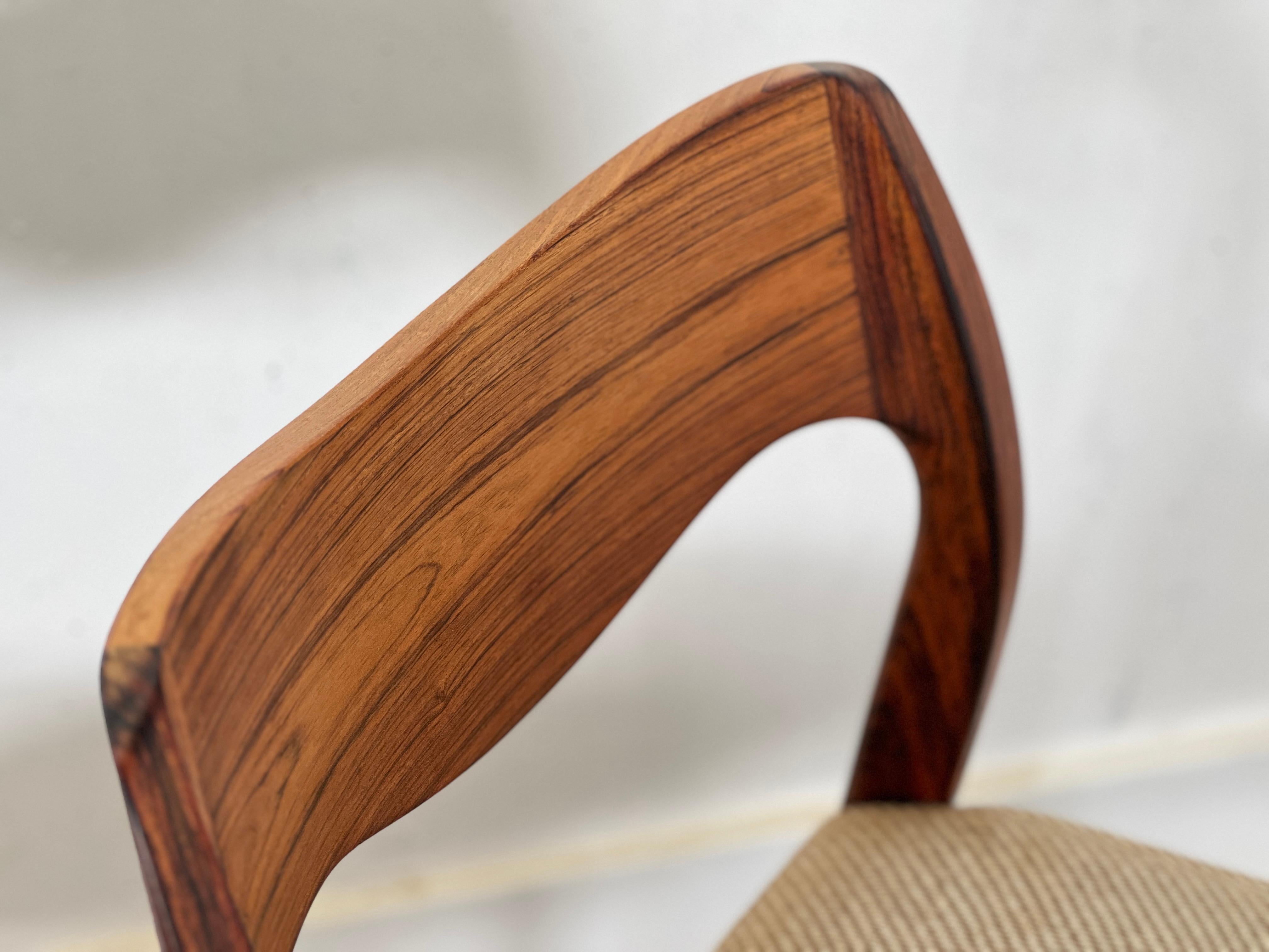 These chairs are a true treasure – Niels Moller originals from the Mid-Century era, handcrafted by JL Møllers Møbelfabrik in Denmark during the 1950s. The solid rosewood used to create these beautiful chairs is simply stunning.

The iconic model