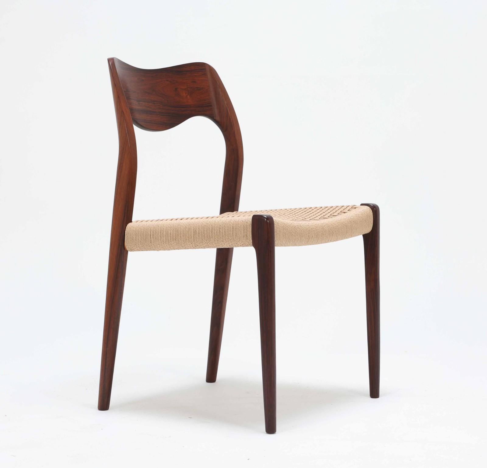 Dining chair made of hardwood, designed 1951 by Niels Otto Møller and produced by J. L. Møller Møbelfabrik, model number 71. Excellent original condition. 


 