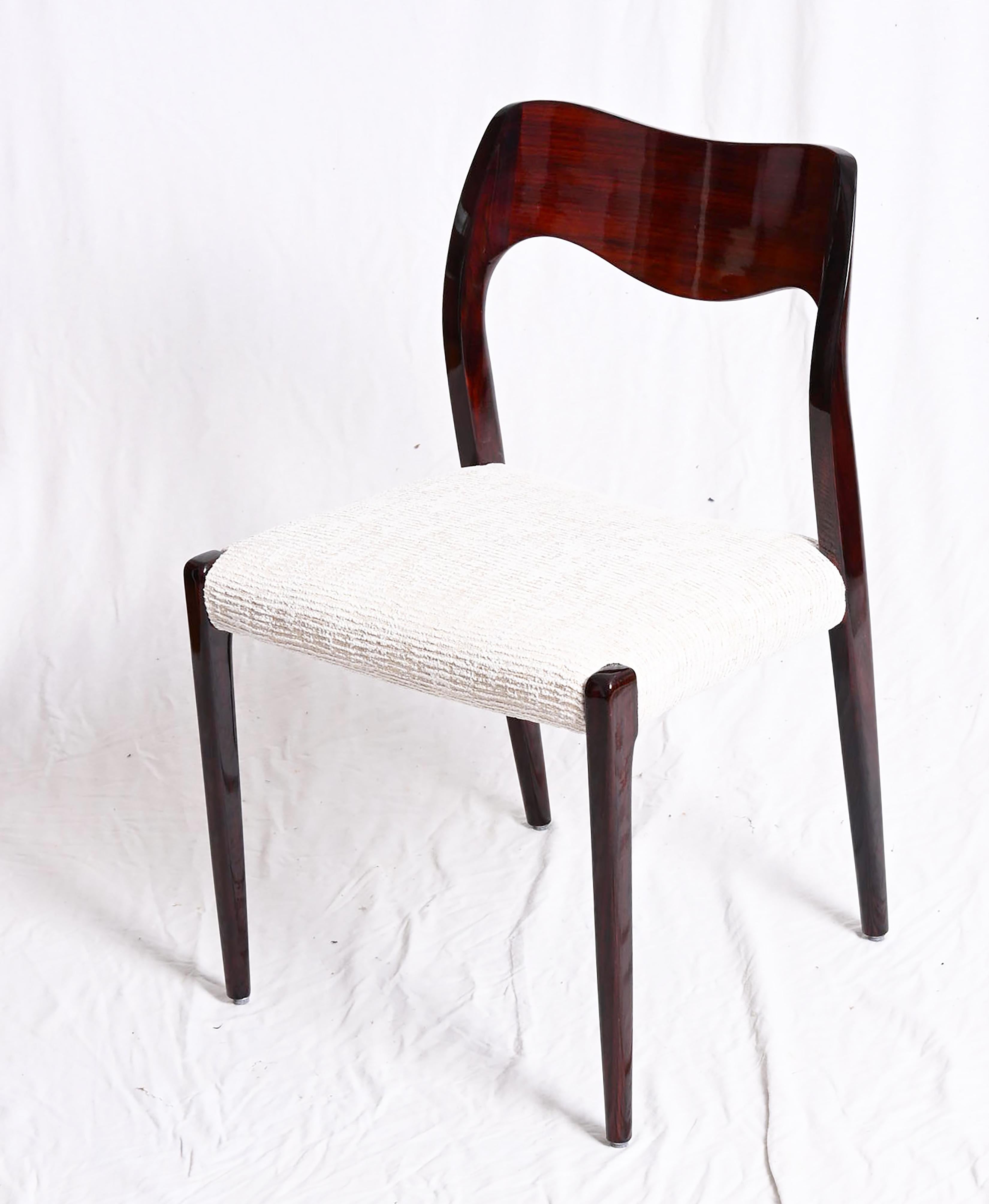 Dining chair made of hardwood, designed 1951 by Niels Otto Møller and produced by J. L. Møller Møbelfabrik, model number 71. Excellent restored with glossy finish new upholstered. (Another fabric or leather of course possible) Up to 16 available,