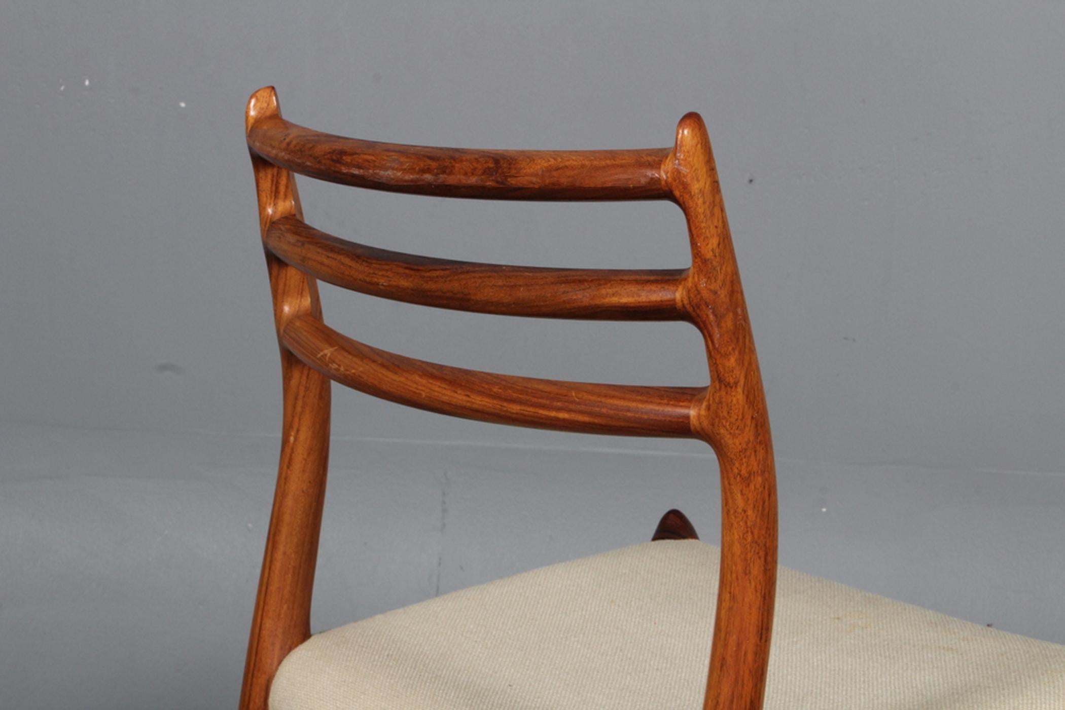 Dining chairs made of solid hardwood, designed in the 1950s by Niels Otto Møller and produced by J. L. Møller Møbelfabrik, model number 78. Original condition. Delivery time about 1-2 weeks. New upholstery on request possible.

