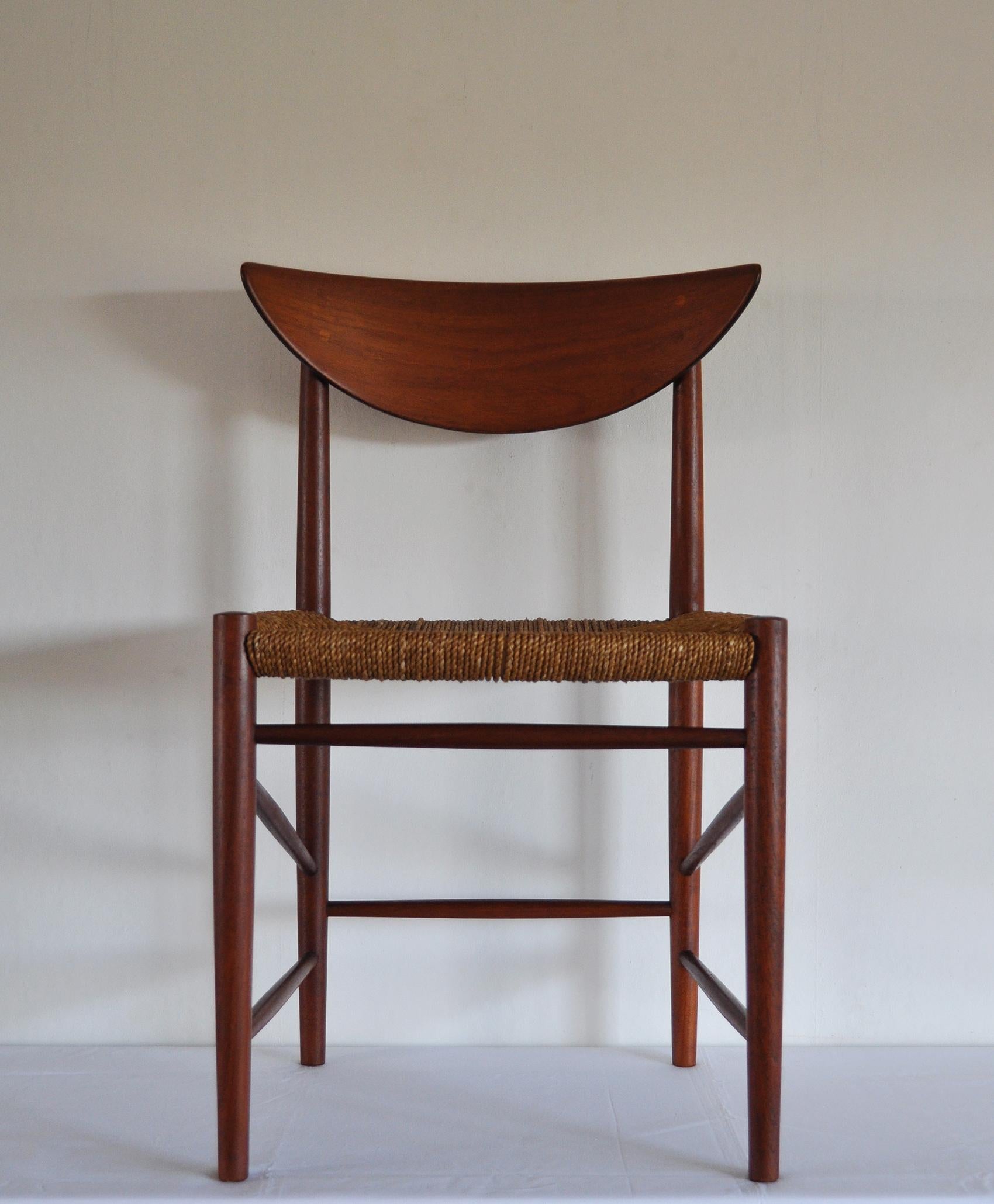 Dining chair model 316 designed by Peter Hvidt & Orla Mølgaard-Nielsen made of solid teak wood with original cord seat. Manufactured by Søborg Møbelfabrik, 1956. 
Very good condition, with minor signs of usage.

Dimensions:
Width 48 cm
Depth 46