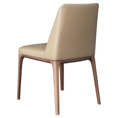 Dining Chair Featuring Solid Wood Legs and Upholstered in Leather
