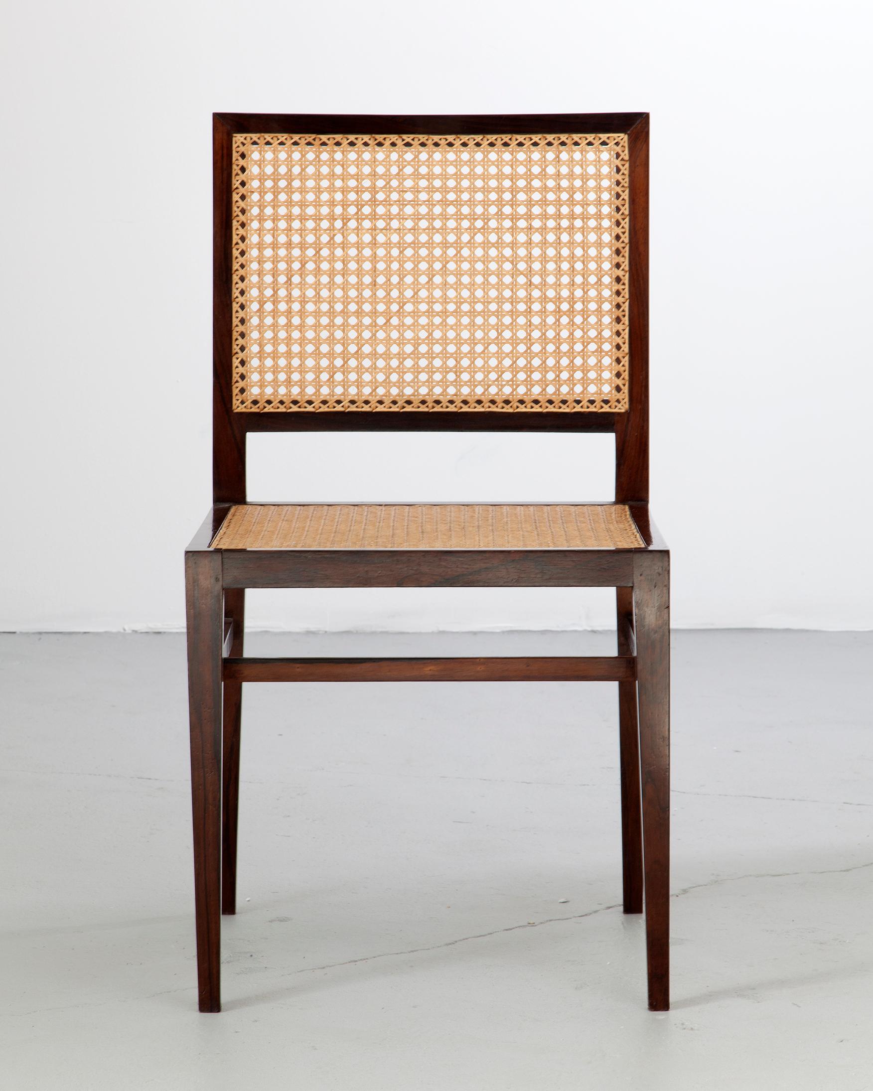 Chair in rosewood with cane seat and back. Designed and made by Branco & Preto, Brazil, 1950s. (seat: 17