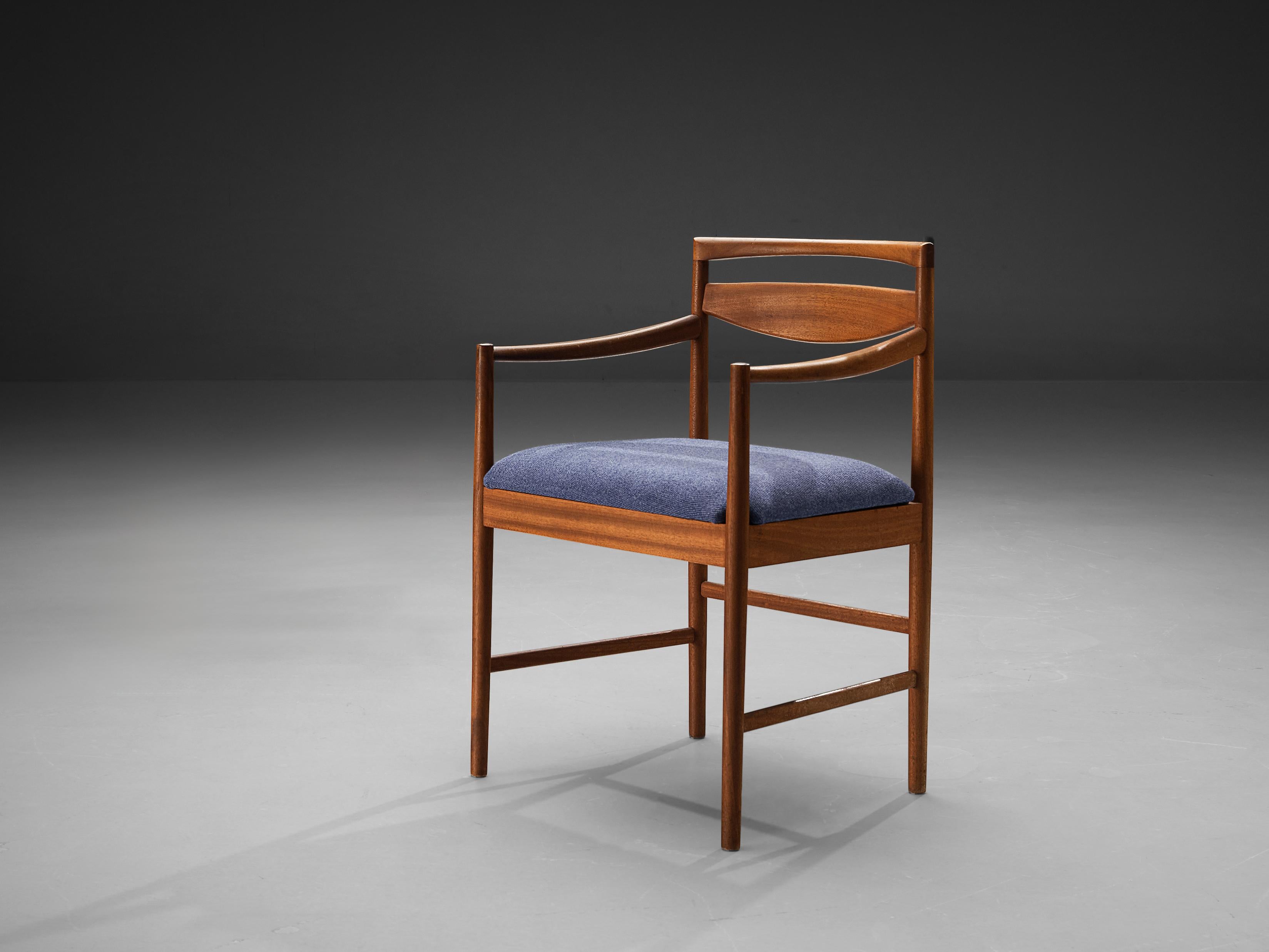 Dining chair, teak, fabric, Europe, 1960s. 

Stunning dining chair made in Europe in the 1960s featuring a striking backrest. The model is angular and modest as it is build up in mainly horizontal and vertical lines. Only the backrest is curved and