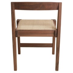 Silla de comedor en nogal y caña by Boyd & Allister