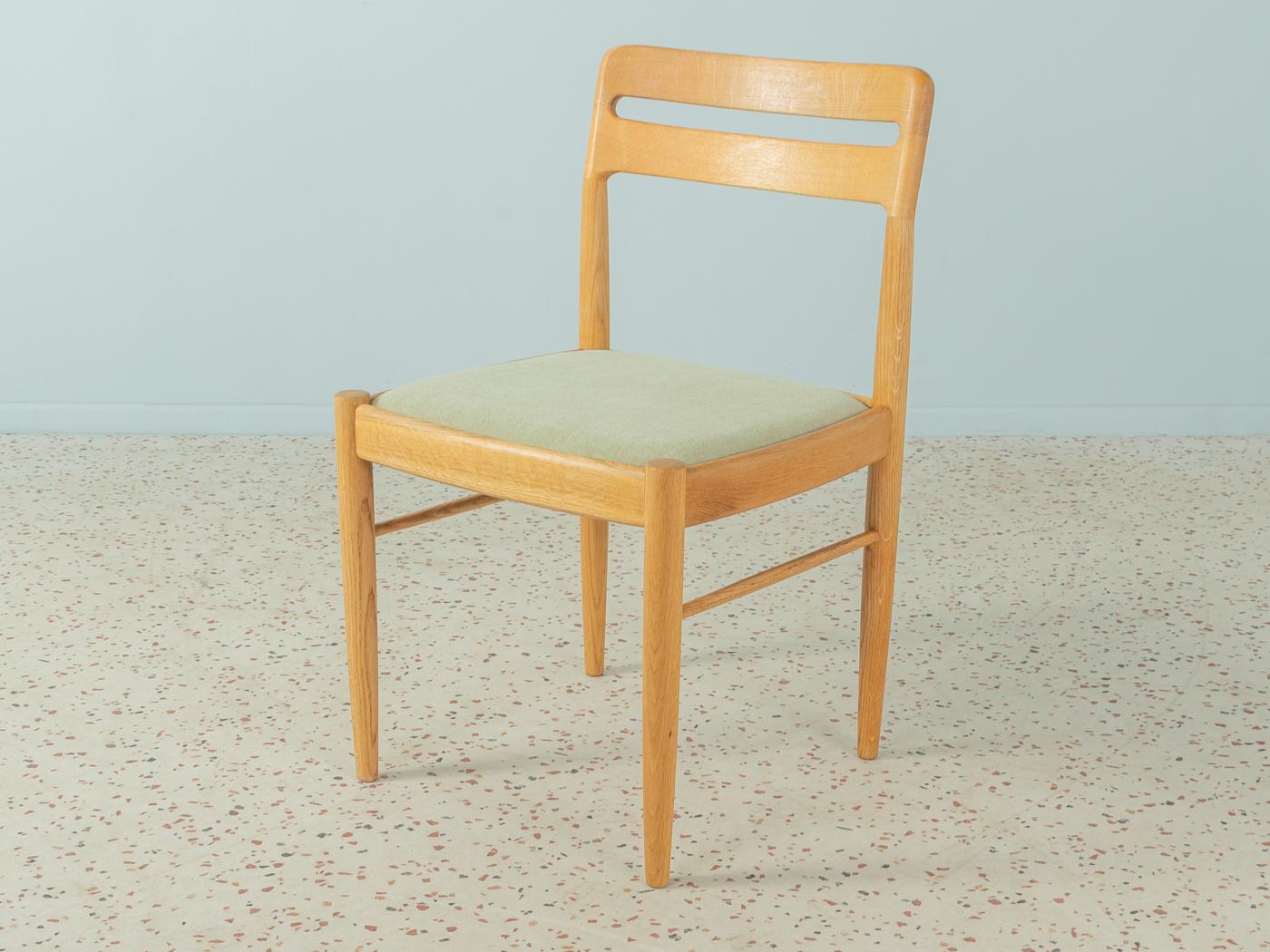 Classic dining chairs from the 1960s by H.W. Klein for Bramin. Solid oak frame. The chairs have been reupholstered and covered with a high-quality fabric in four summery colours. The offer includes 4 chairs.

Quality Features:
accomplished