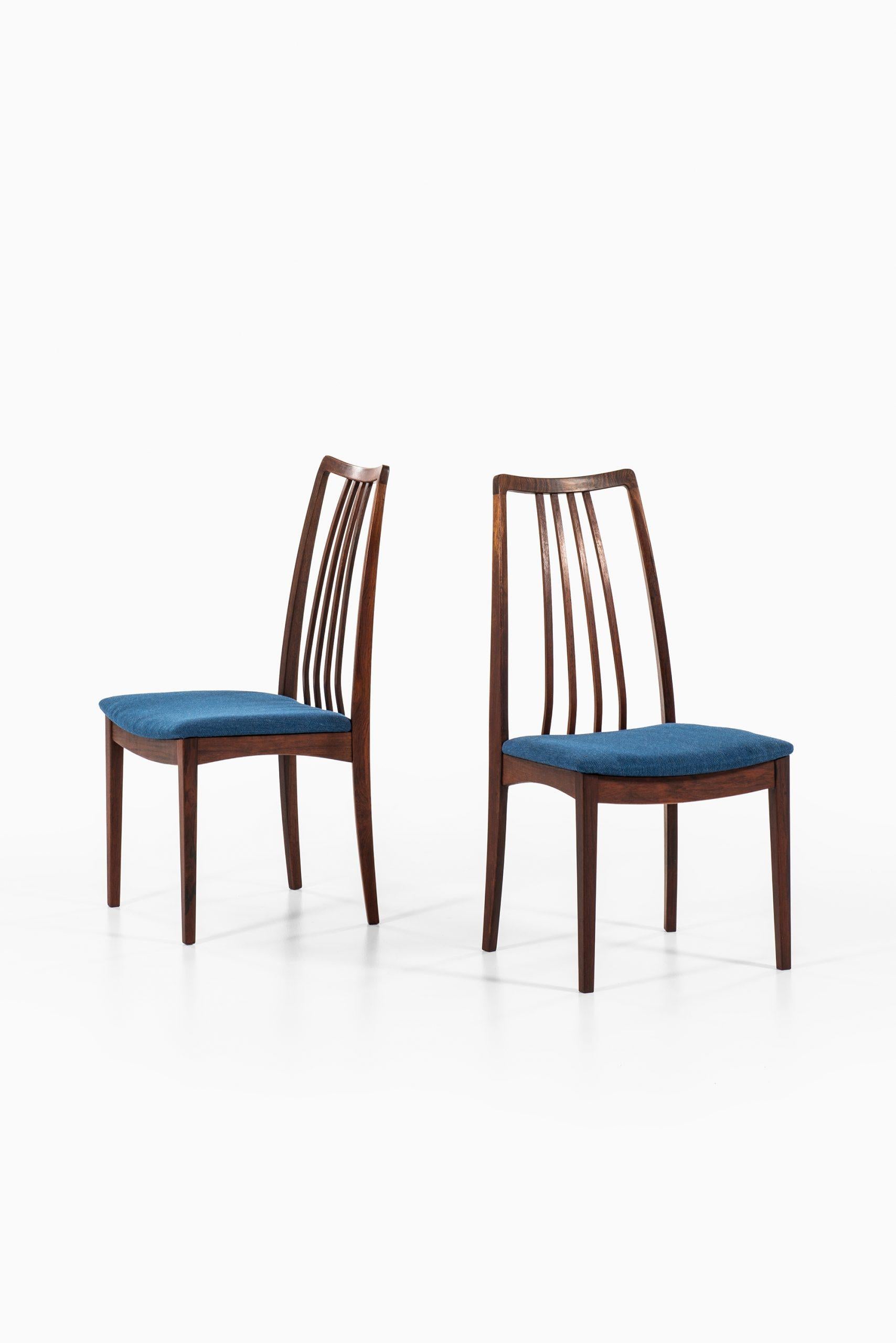 Rare set of 8 high-backed dining chairs attributed to Niels Kofoed. Produced in Denmark.