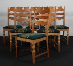 Dining Chairs by Henning Kjærnulf