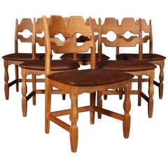 Dining Chairs by Henning Kjærnulf