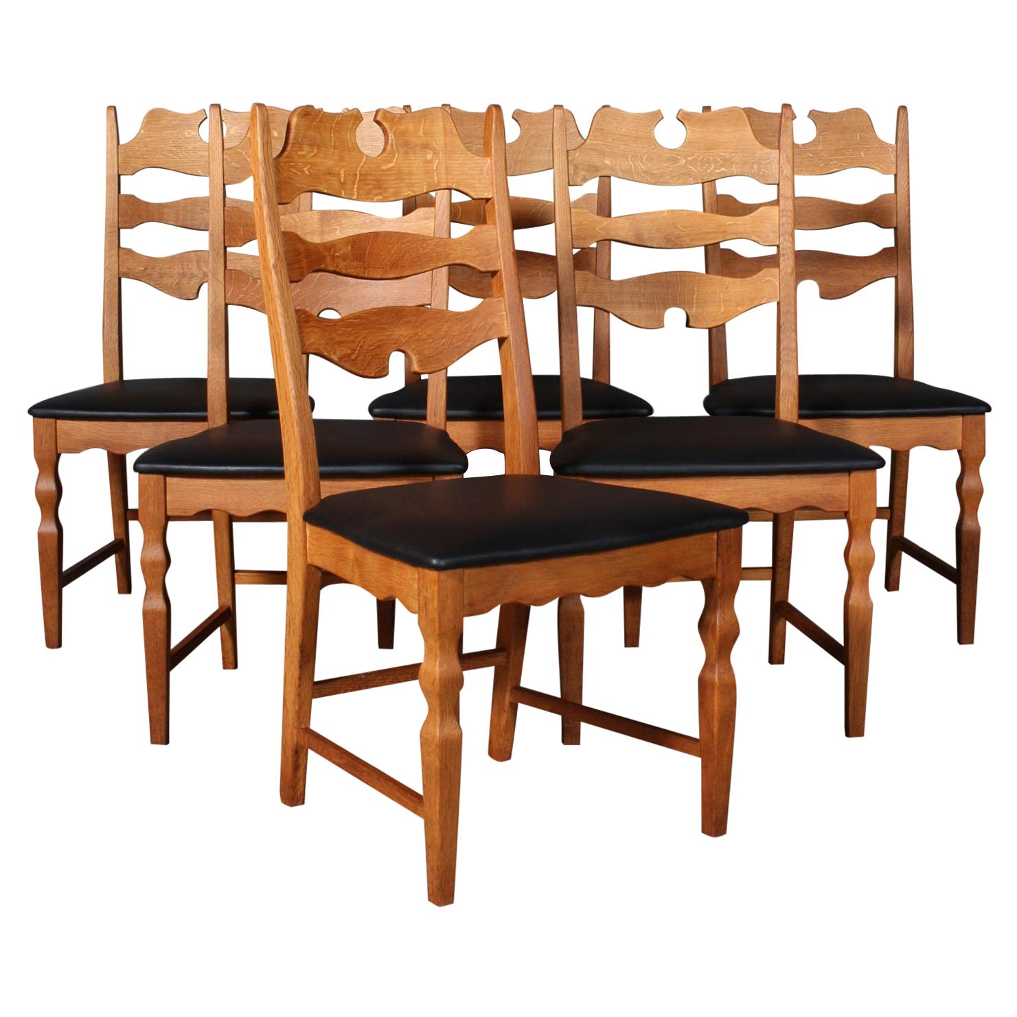 Dining Chairs by Henning Kjærnulf
