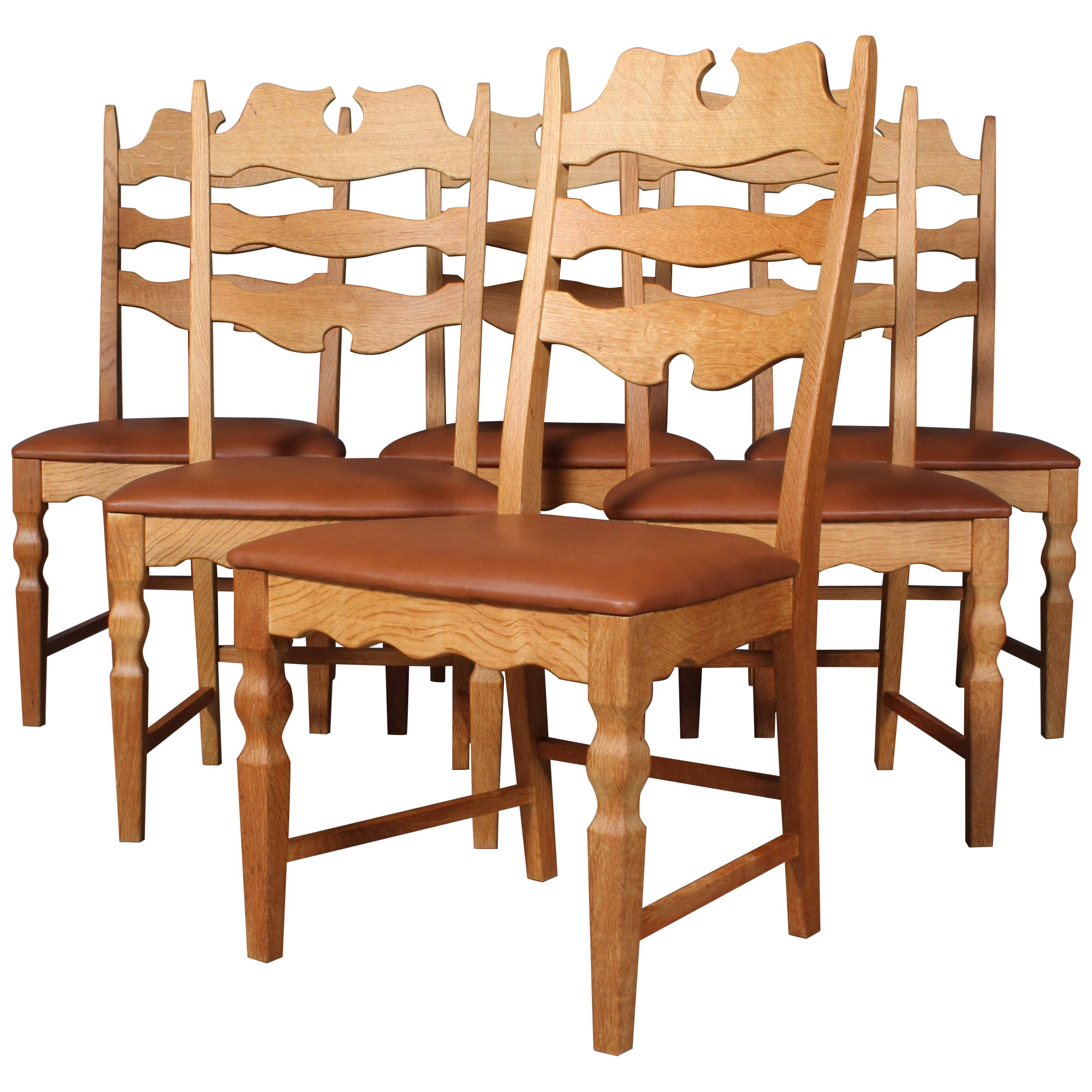 Dining Chairs by Henning Kjærnulf