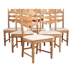 Dining Chairs by Henning Kjærnulf