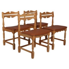 Dining Chairs by Henning Kjærnulf