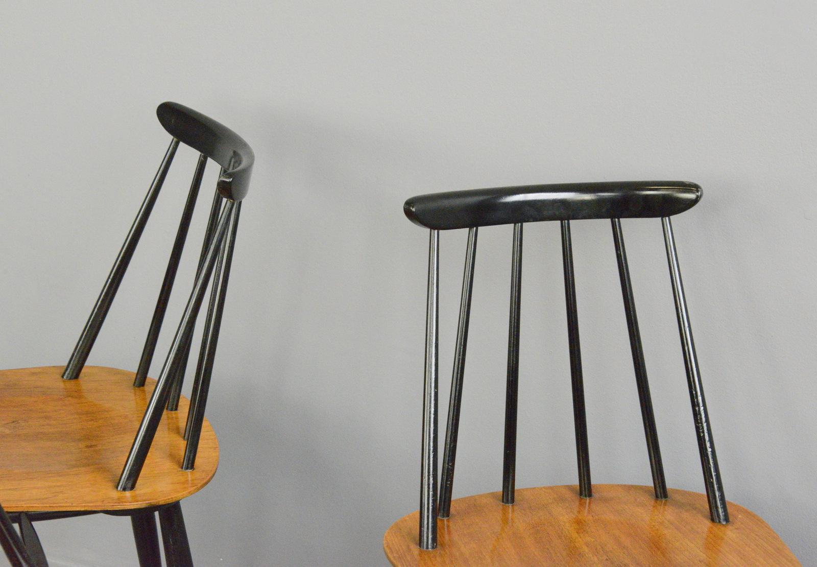 Dining chairs by Ilmari Tapiovaara Circa 1960s

- Black frames with teak ply seats
- Designed by Ilmari Tapiovaara
- Produced by Asko
- Finnish ~ 1960s
- Measures: 46cm wide x 43cm deep x 79cm tall
- 45cm seat height

Ilmari