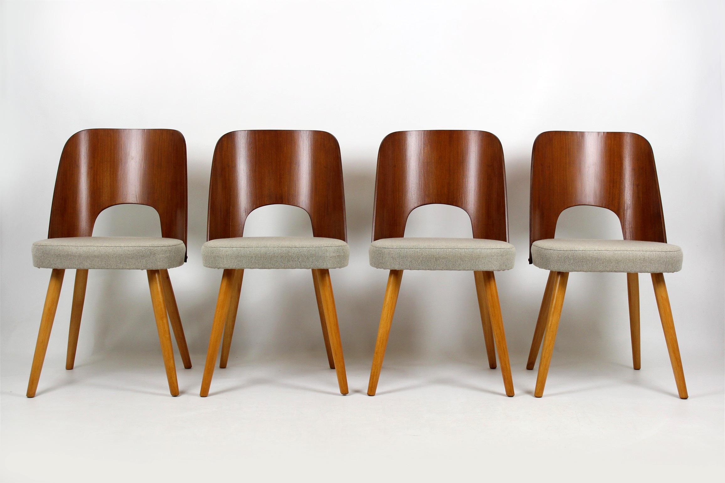 Set of four chairs from Tatra. Designed by Oswald Haerdtl and produced in the 1960s in former Czechoslovakia. Backrests made of veneered bent plywood. Seats reupholstered in beige fabric.
