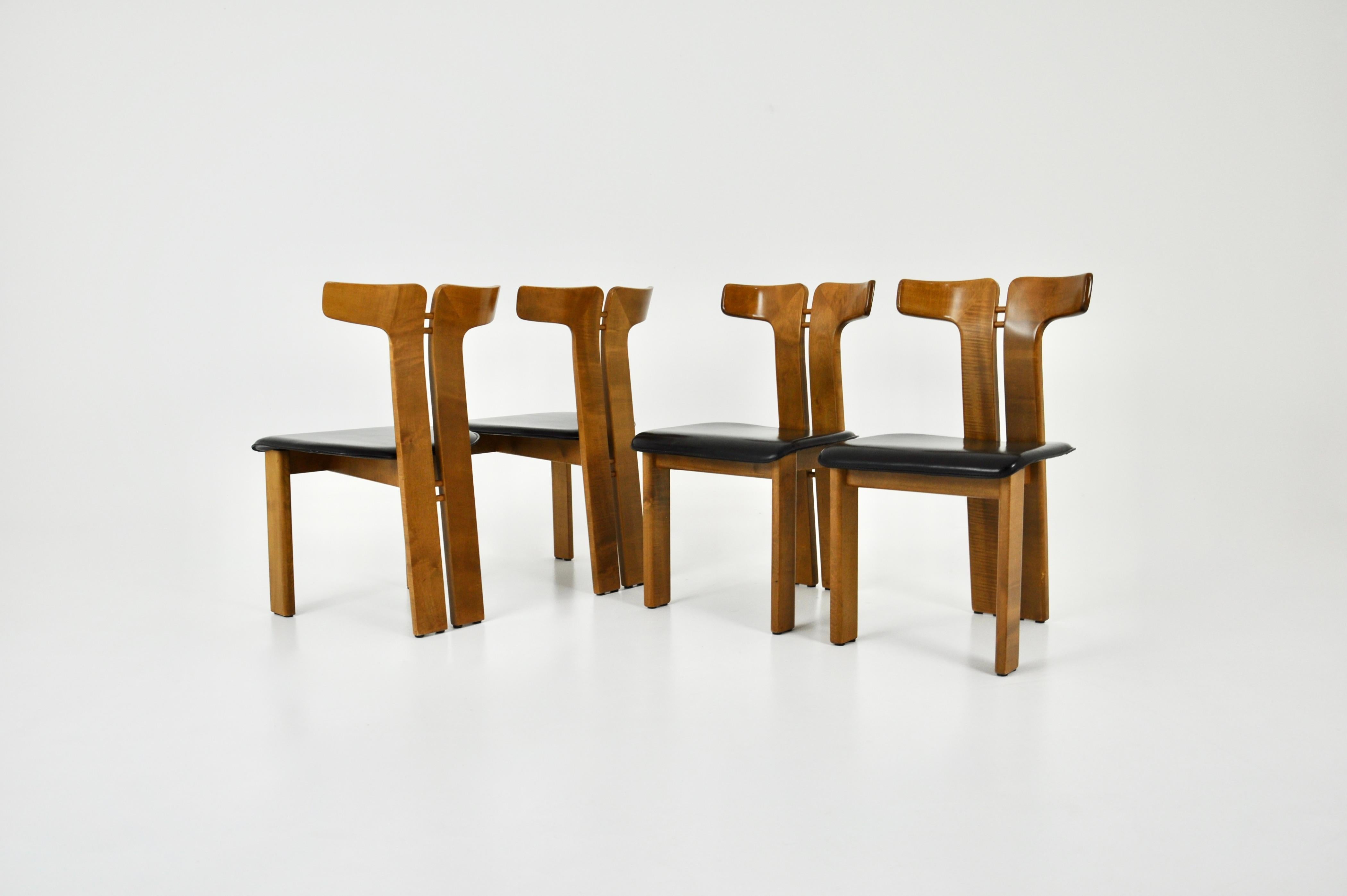 Set of 4 leather and wood chairs by Pierre Cardin Italy 1980s. Seat height: 42cm. Wear due to time and age of the chairs.