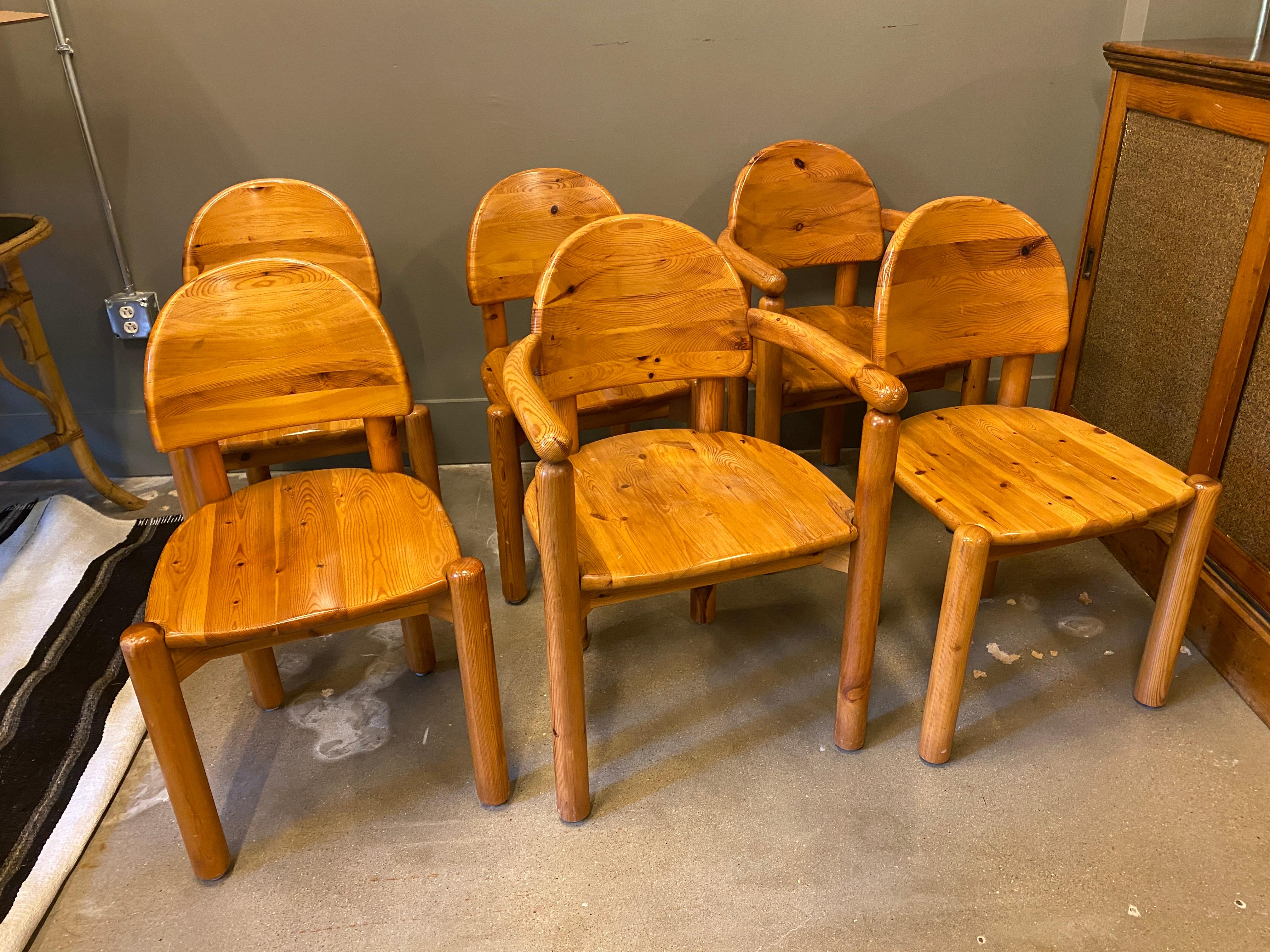 A hard to find set of Mid-Century Modern or Scandinavian Modern dining chairs designed by Rainer Daumiller, Danish architect and designer. Manufactured by Hirtshals Savværk (Hirtshals Sawmill) in Denmark of solid pine. Comfortable. Set includes 4