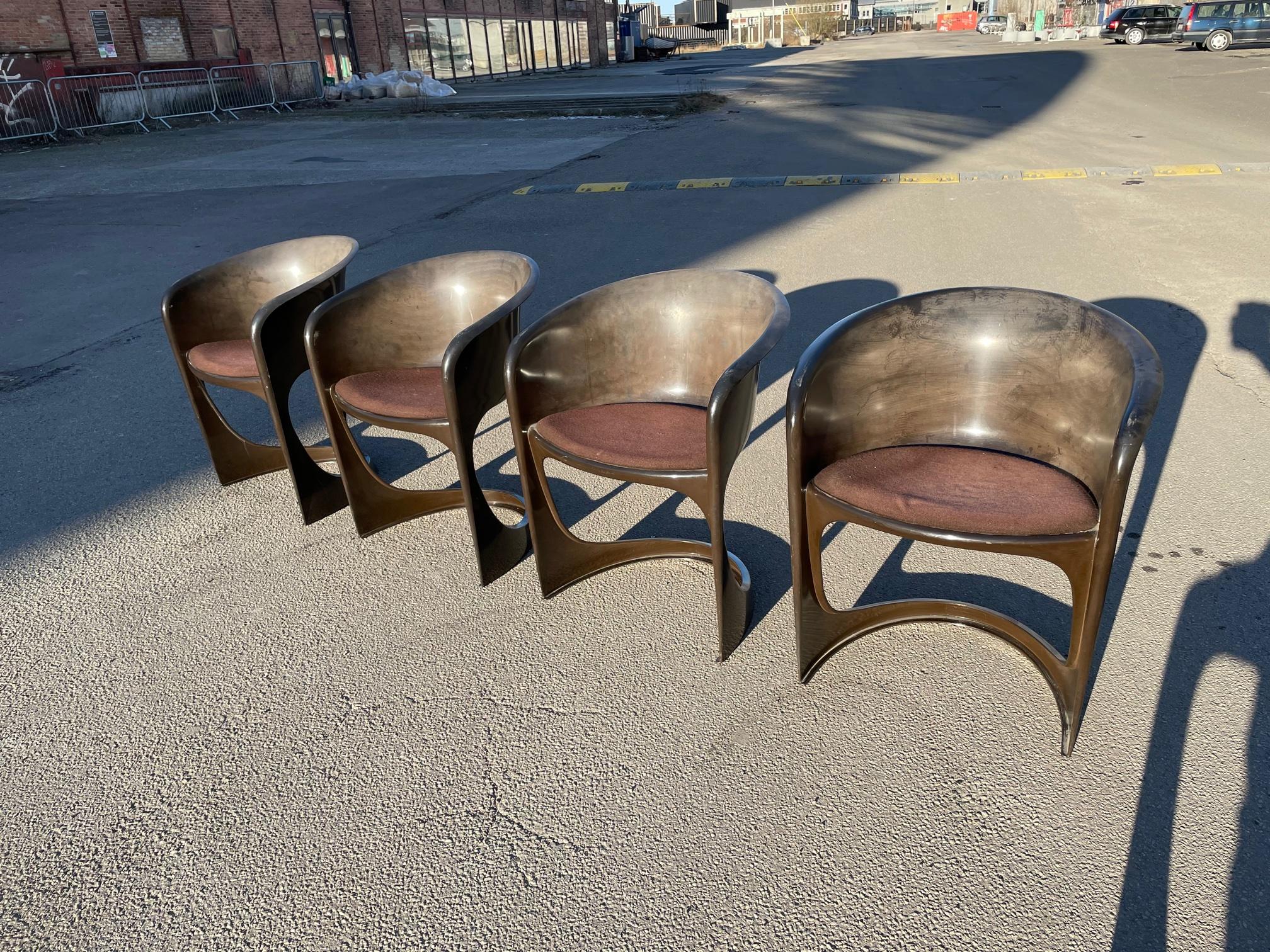 Set of 4. Steen Ostergaard Cado period molded plastic all original stack chairs with original cushion in all original condition, rare and unusual set.