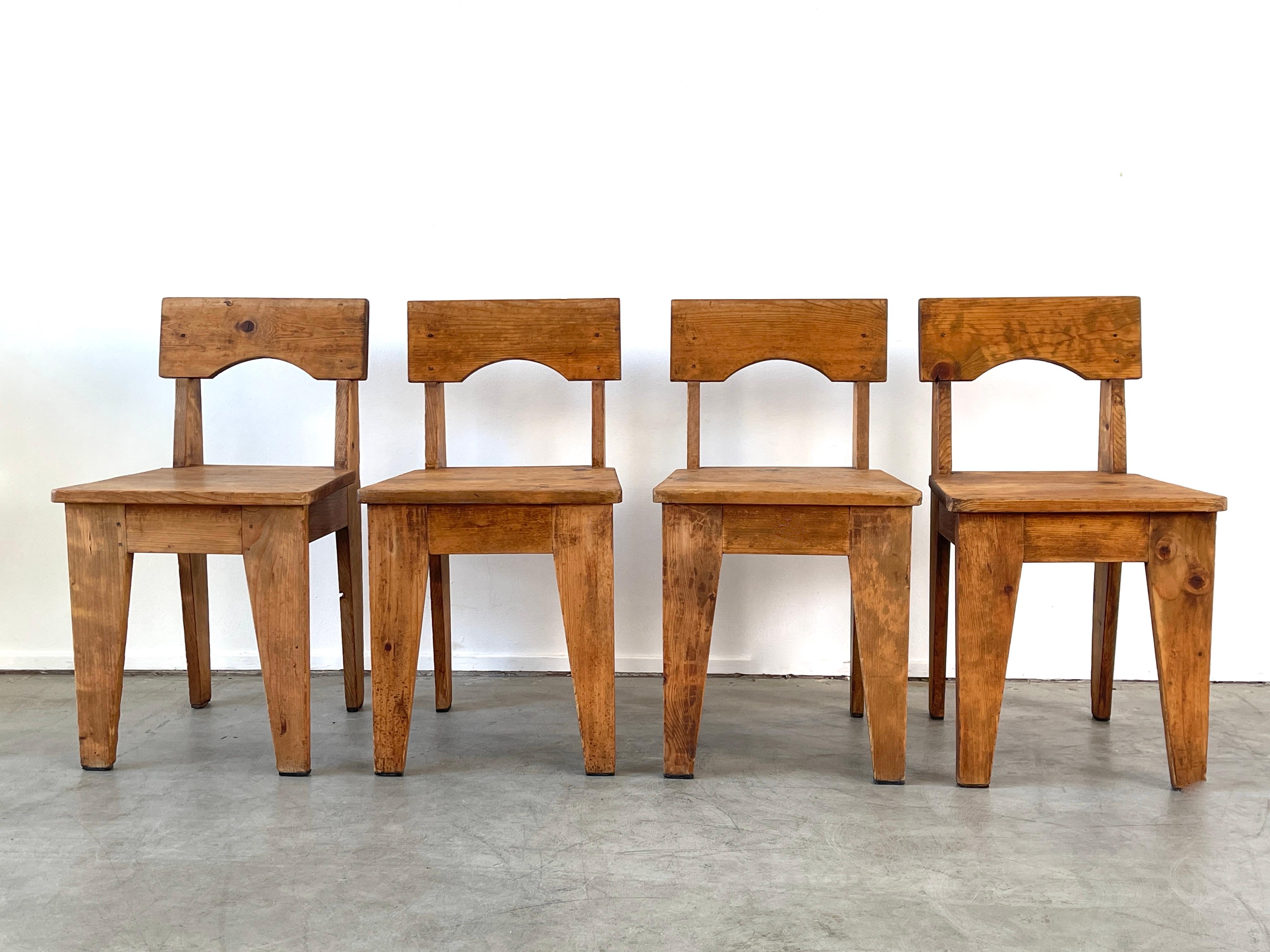 Great set of 4 chairs in raw oak with angular lines indicative of Rene Gabriel 
Wonderful patina and solid construction.