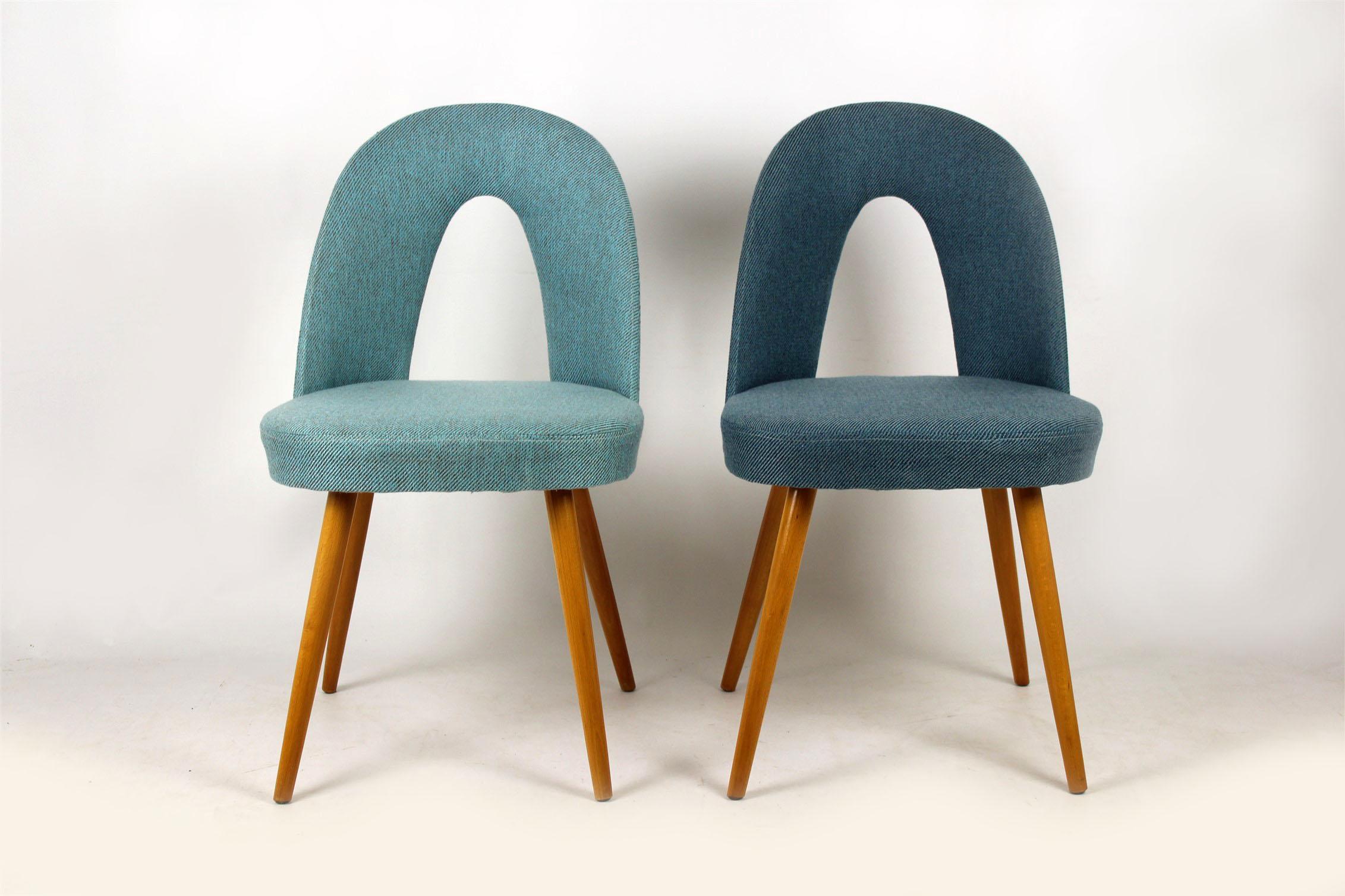 Set of two chairs produced, circa 1960 in former Czechoslovakia. Designed by Antonin Suman for Zapadoslovenske Nabytkove Zavody. Upholstered in new blue and turquoise fabric upholstery.