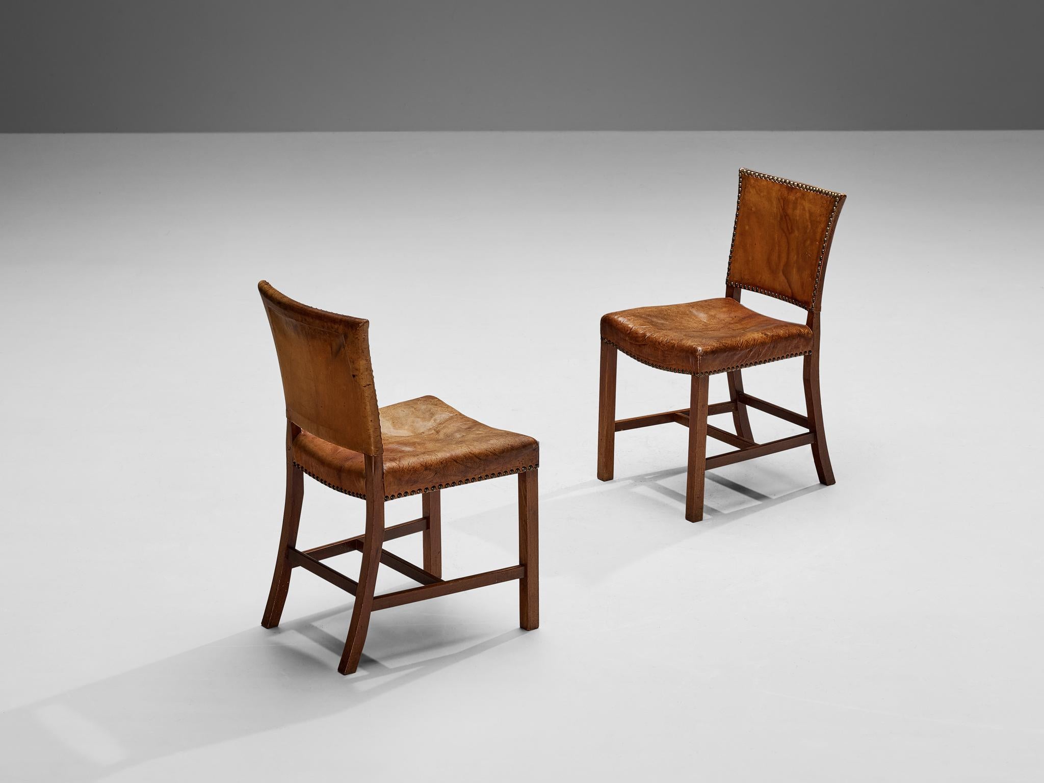Attributed to Andreas Jeppe Iversen (A.J. Iversen), dining chairs, Niger leather, mahogany, brass, Denmark, 1925/1935

An elegant piece of furniture crafted between 1925 and 1935, reflecting the design principles that were prevalent during that