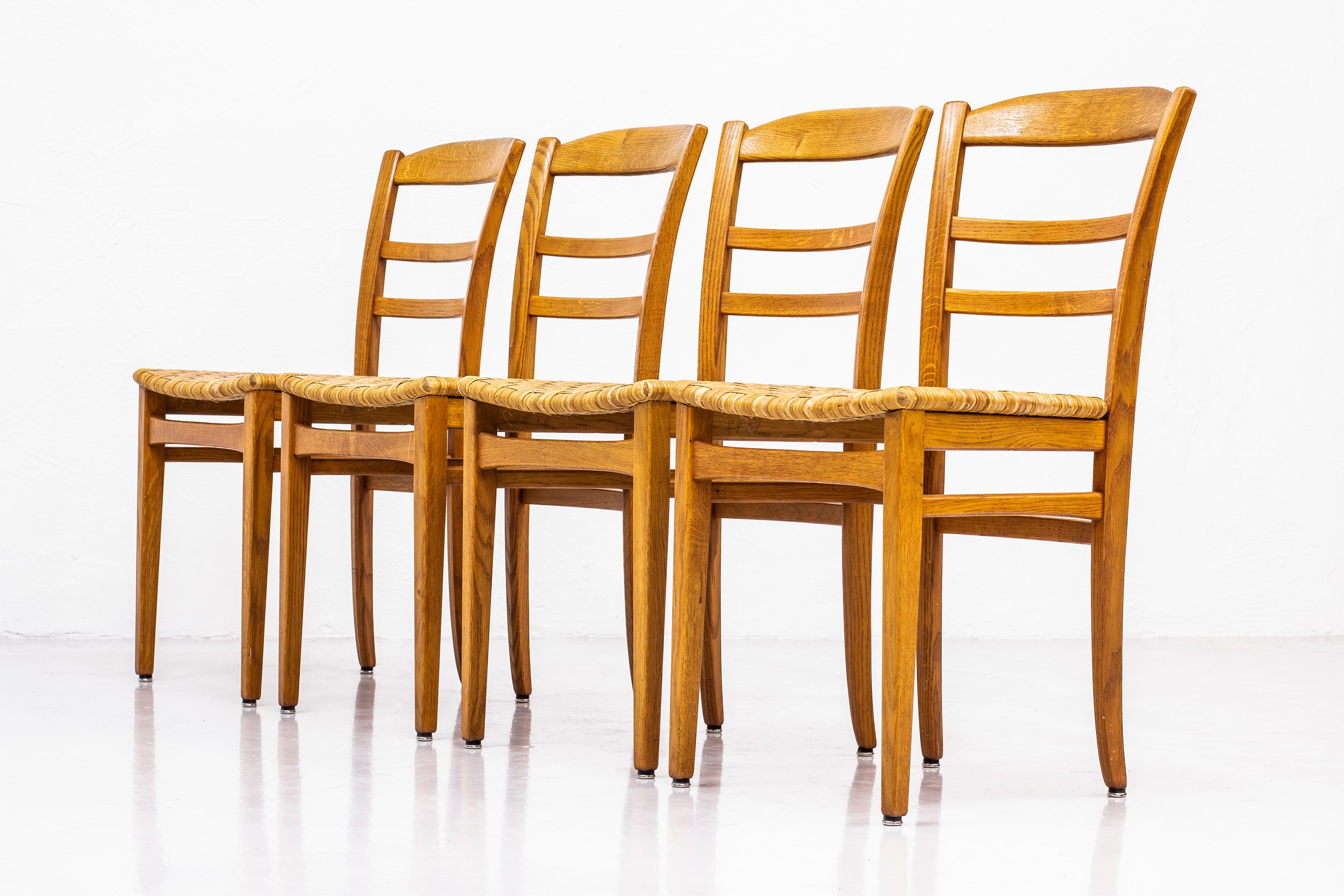 Dining chairs designed by Carl Malmsten. produced in Sweden by O. H. Sjögren during the 1950s. Solid oak with woven cane seats. Very good vintage condition with light age related patina. 

 

Price for the set of four chairs.
