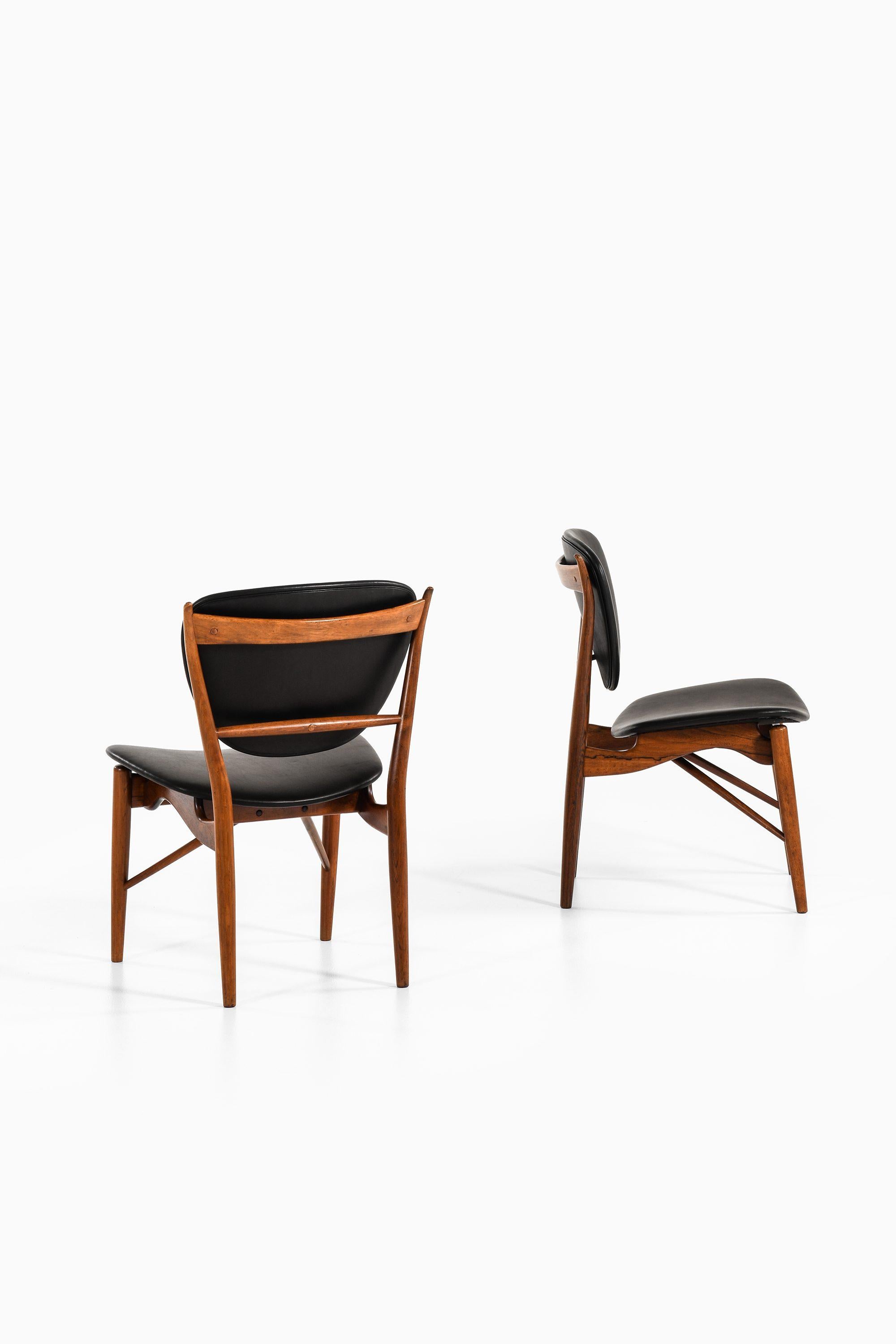 Dining Chairs in Rosewood and Black Leather by Finn Juhl, 1951 In Good Condition For Sale In Limhamn, Skåne län