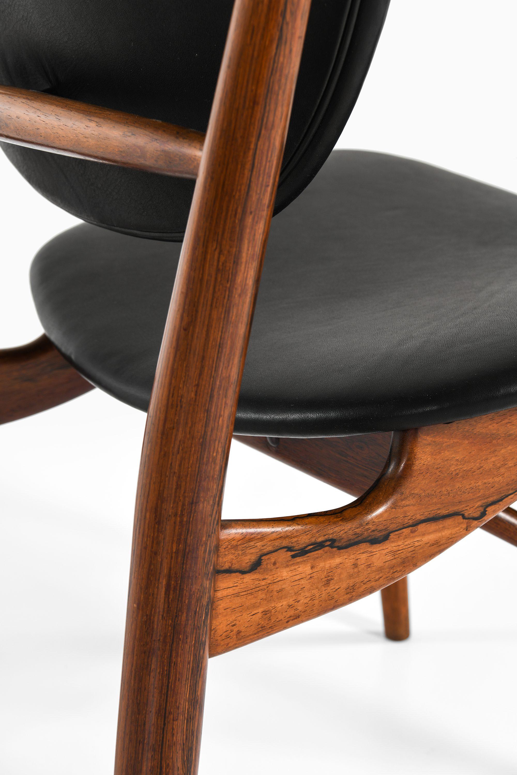 Dining Chairs in Rosewood and Black Leather by Finn Juhl, 1951 For Sale 3