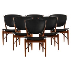 Dining Chairs in Rosewood and Black Leather by Finn Juhl, 1951