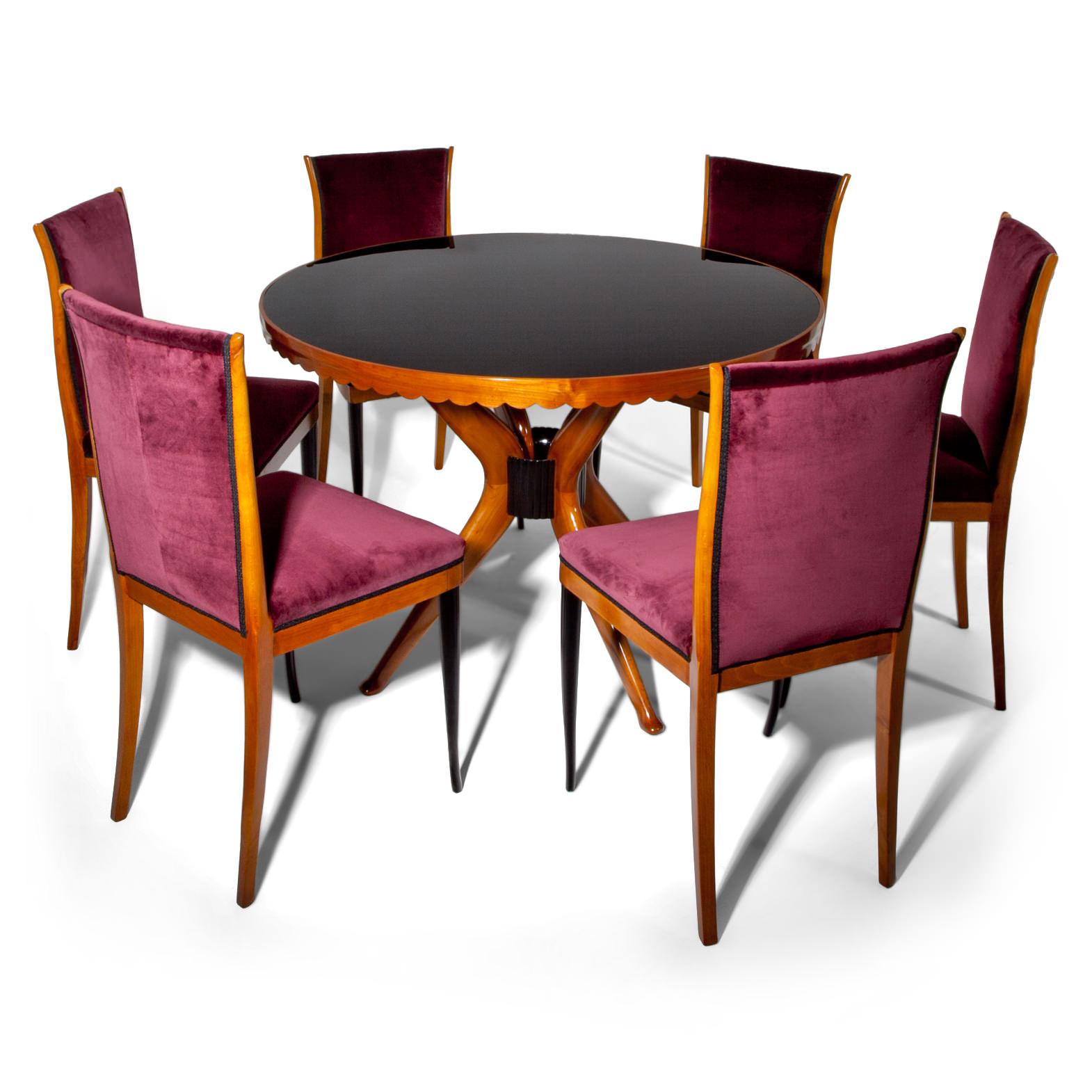 Set of six dining room chairs with ebonized front legs and Bordeaux colored upholstery on seat and backrests.