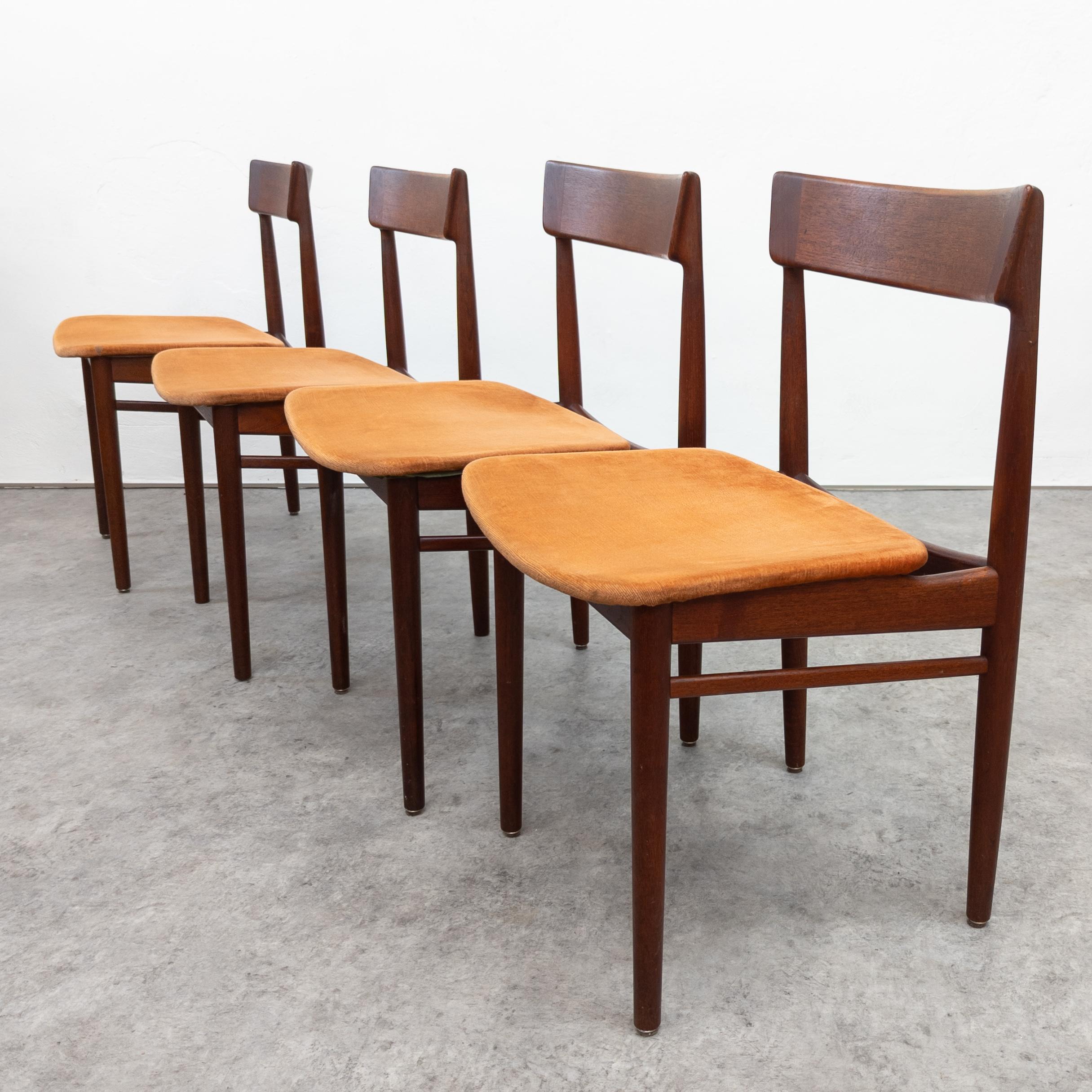 Set of four model 39 dining chairs in rosewood and dark orange fabric. Designed by Henry Rosengren Hansen for Brande Møbelindustri in Denmark during the 1960s. The chairs feature a solid rosewood frame in very good refinished condition. Original