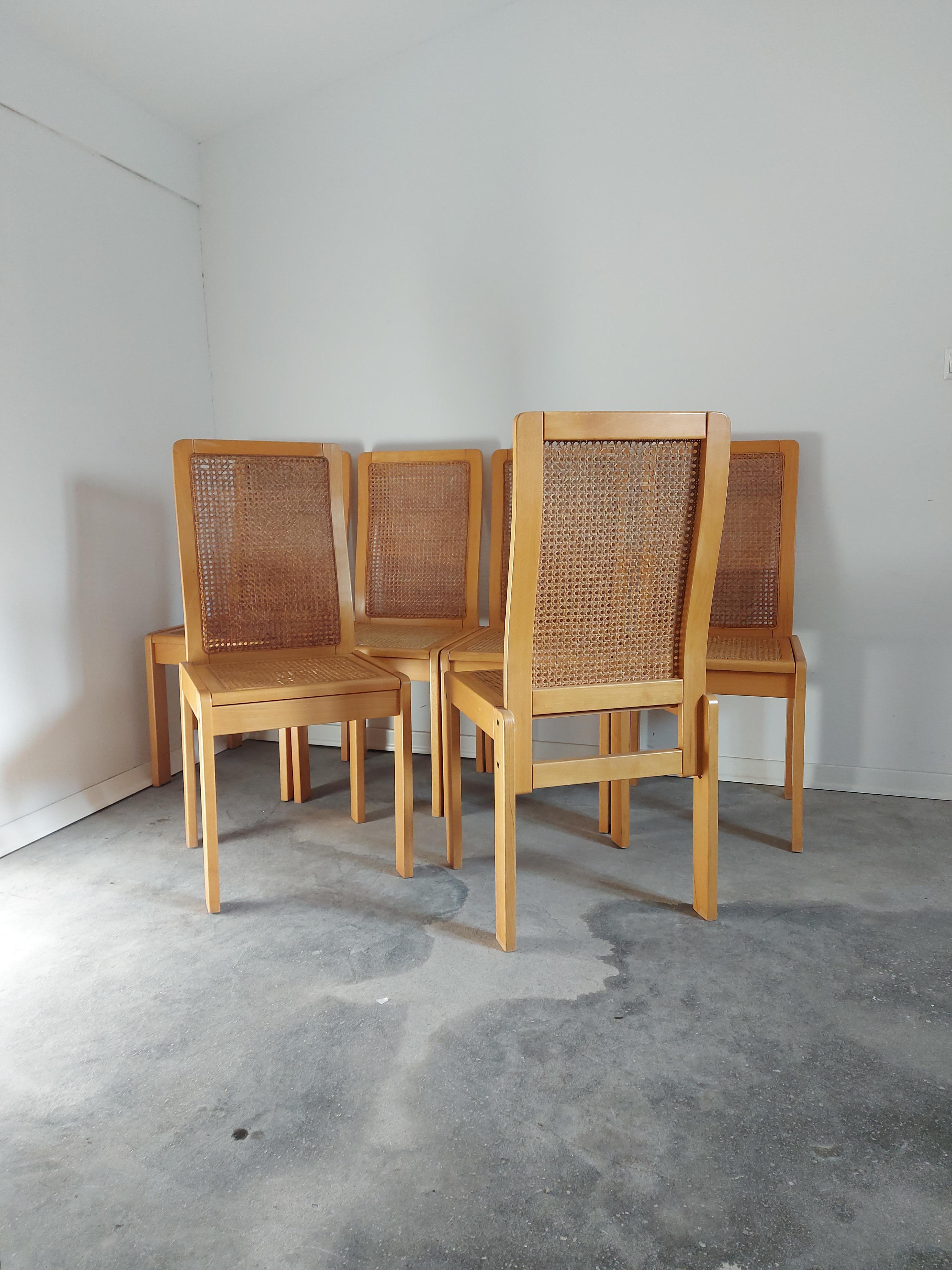 Rare dining chairs, cane seat and back;

Material: wood, cane;

Period: 1970s;

Style: Mid-century;

Condition: Original condition (broken parts of cane on back rest);

Restoration of cane can be done if the buyer wants.