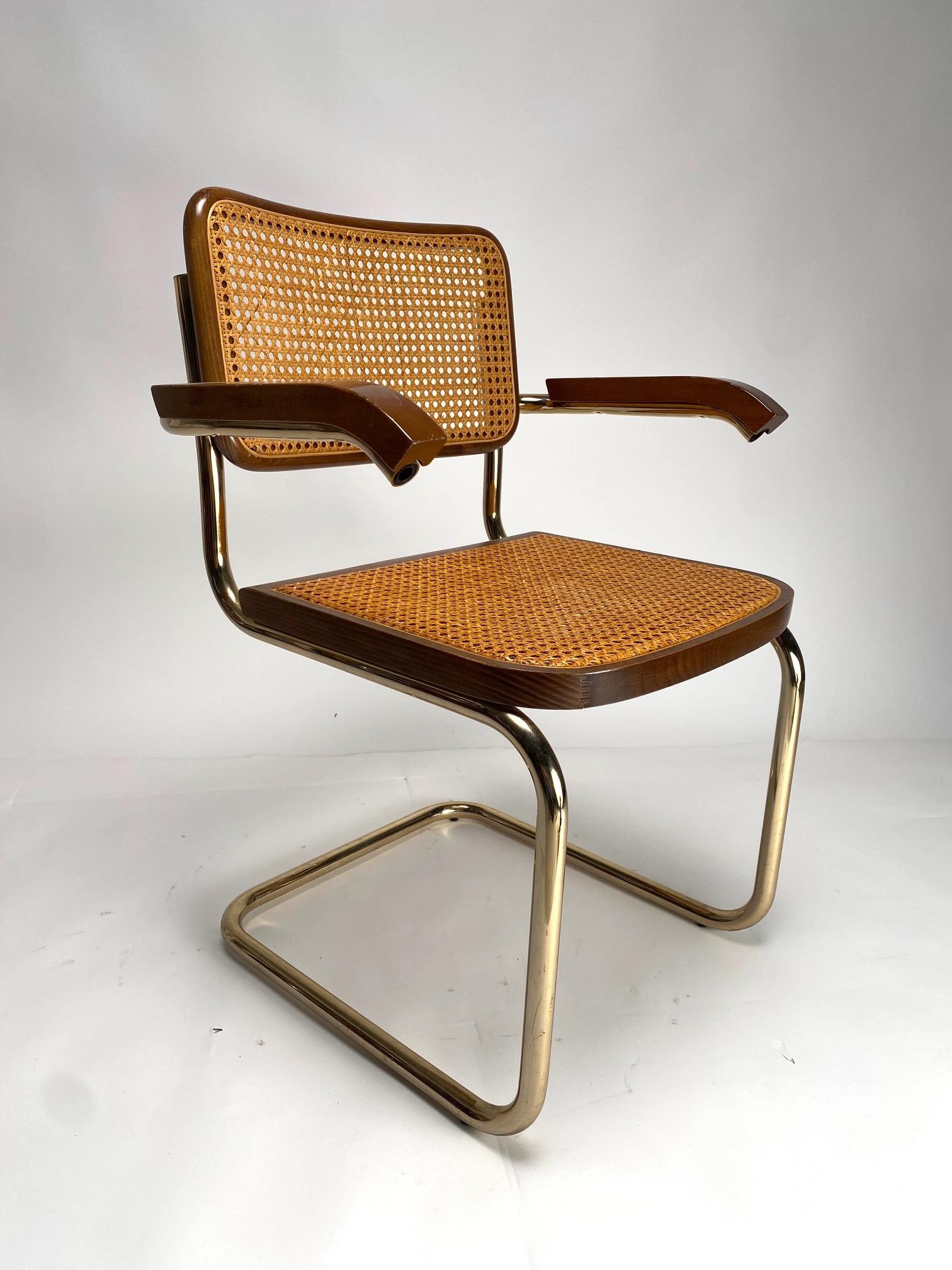 Set of 4 dining chairs Style B32 by Marcel Breuer, in metal, wood and rattan.