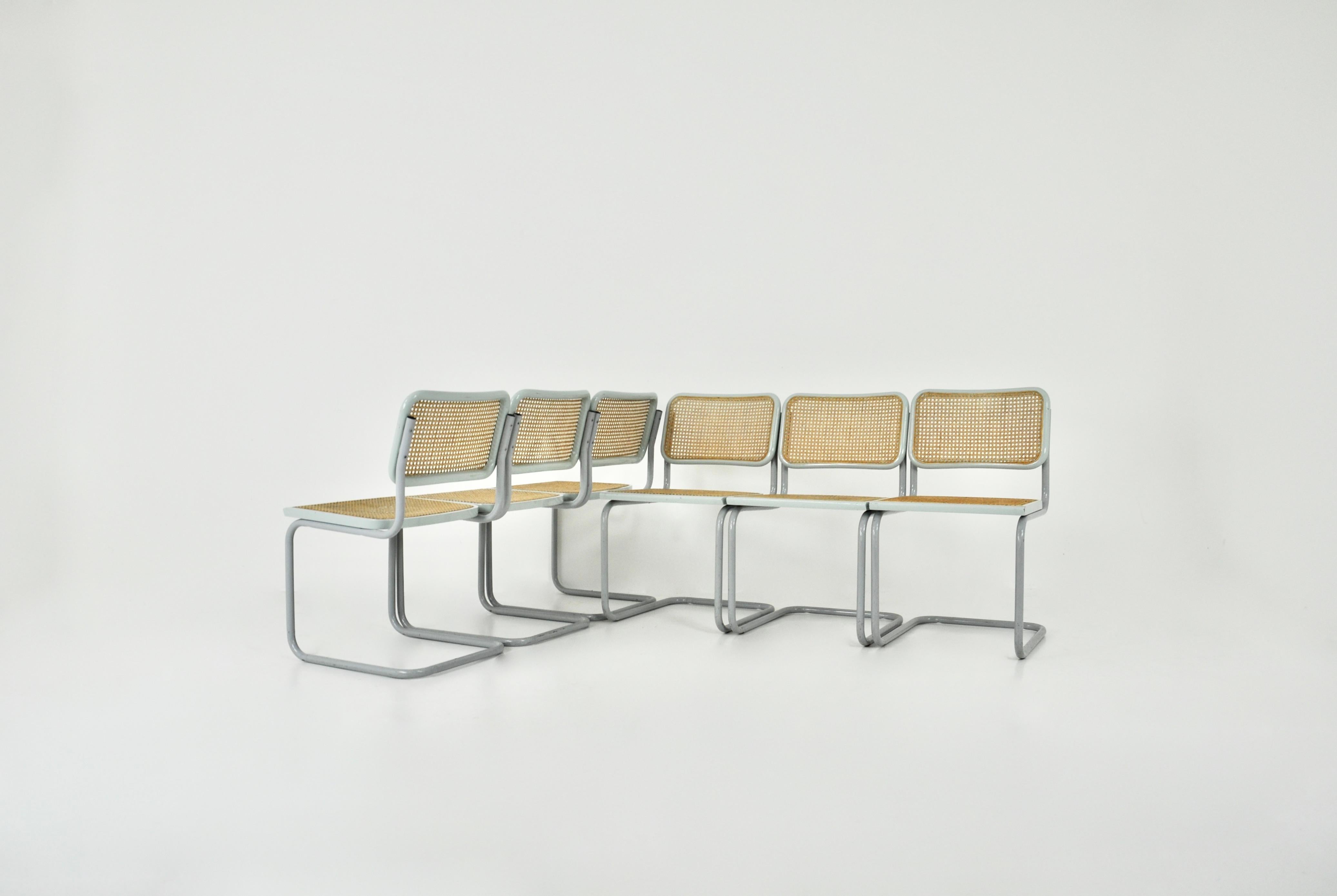 Set of 6 all-grey chairs in metal, wood and rattan. Dimensions: seat height: 46 cm. Wear due to time and age of the chairs.



