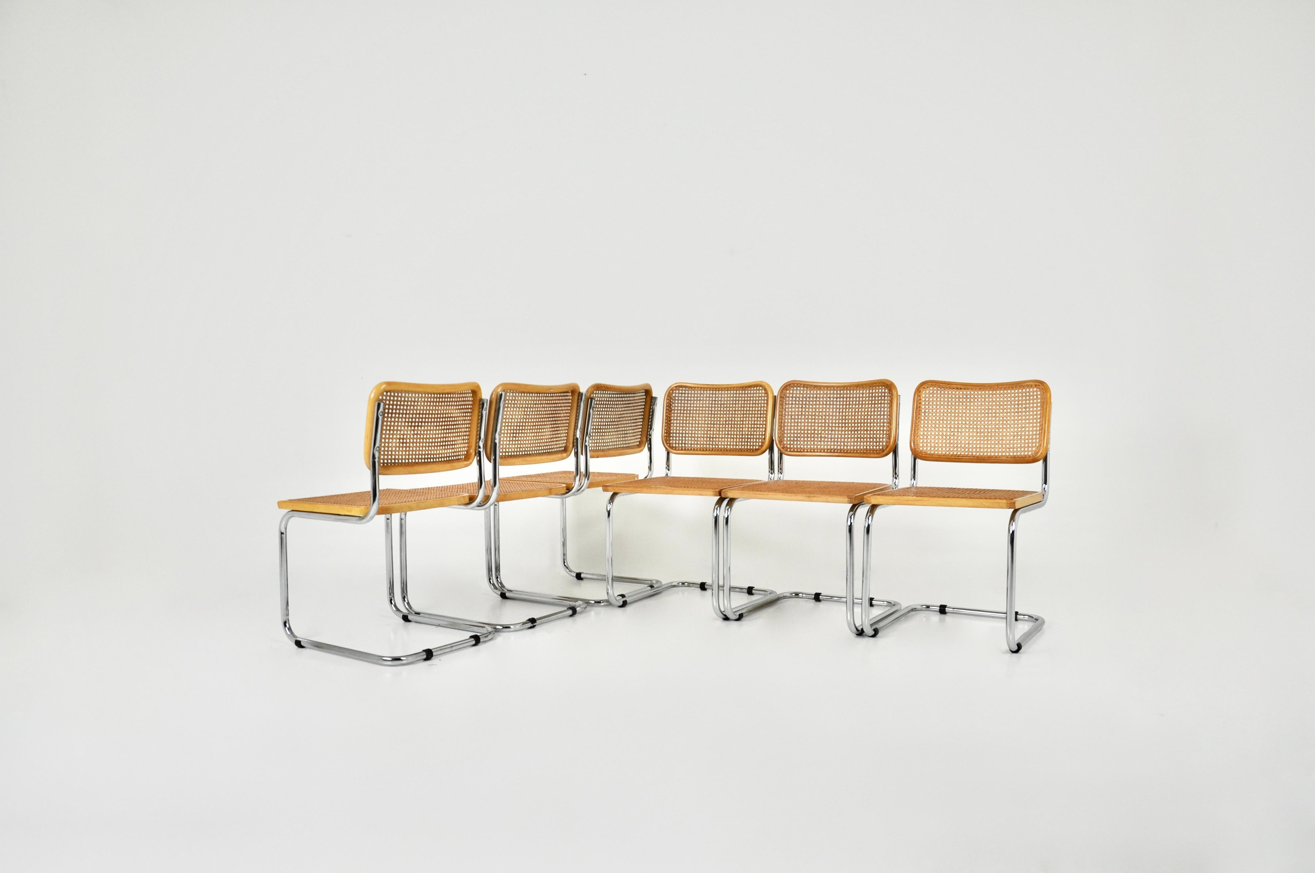 Set of 6 chairs in metal, wood and rattan. Dimensions: seat height: 45 cm. Wear due to time and age of chairs