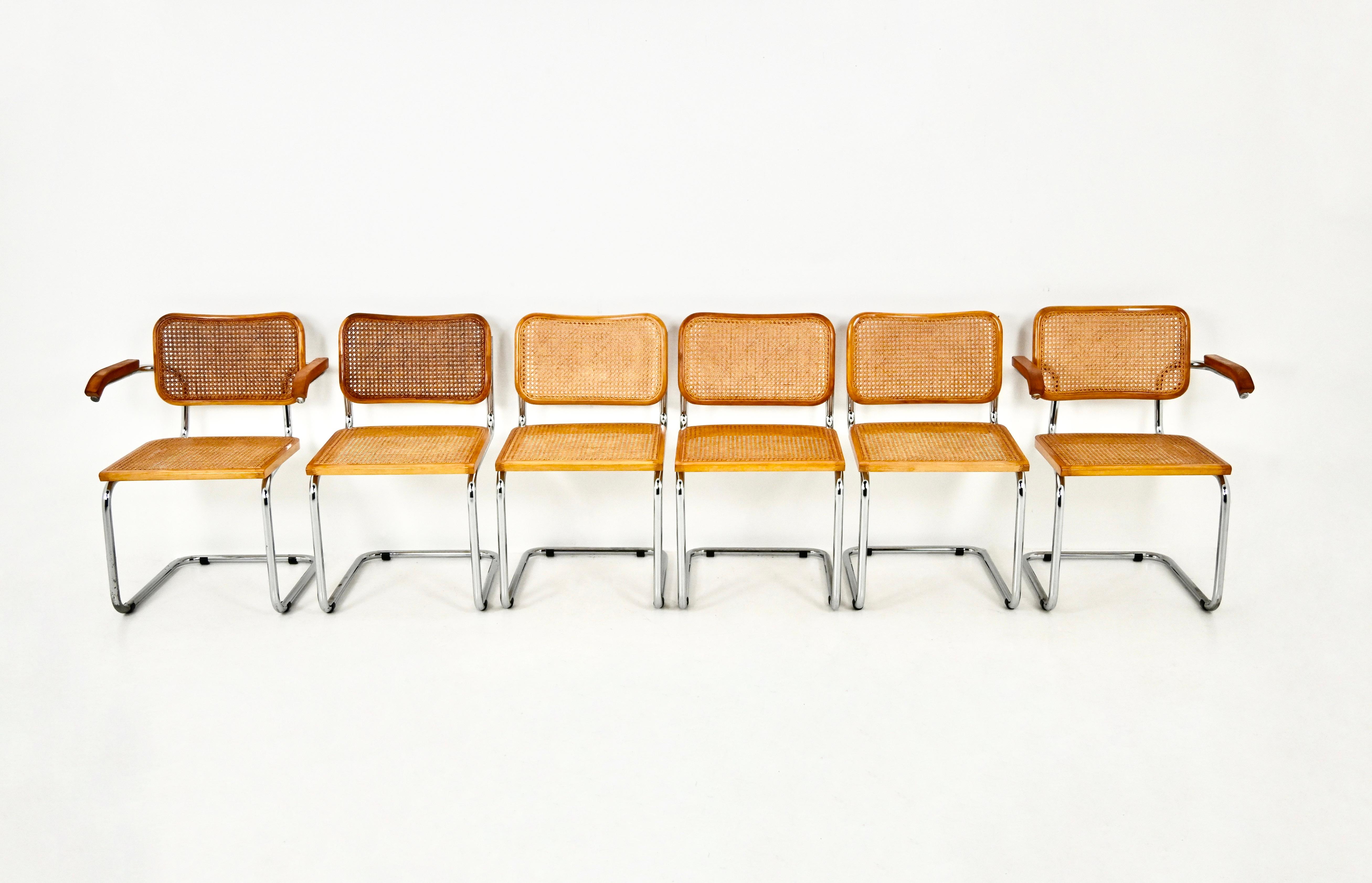 Set of 6 chairs in metal, wood and rattan. 
Dimensions: seat height: 46 cm. Width with armrests: 61 cm 
Wear due to time and age of the chairs. 
FOR SHIPPING, REQUEST US FOR RECEIVE THE BEST PRICE



