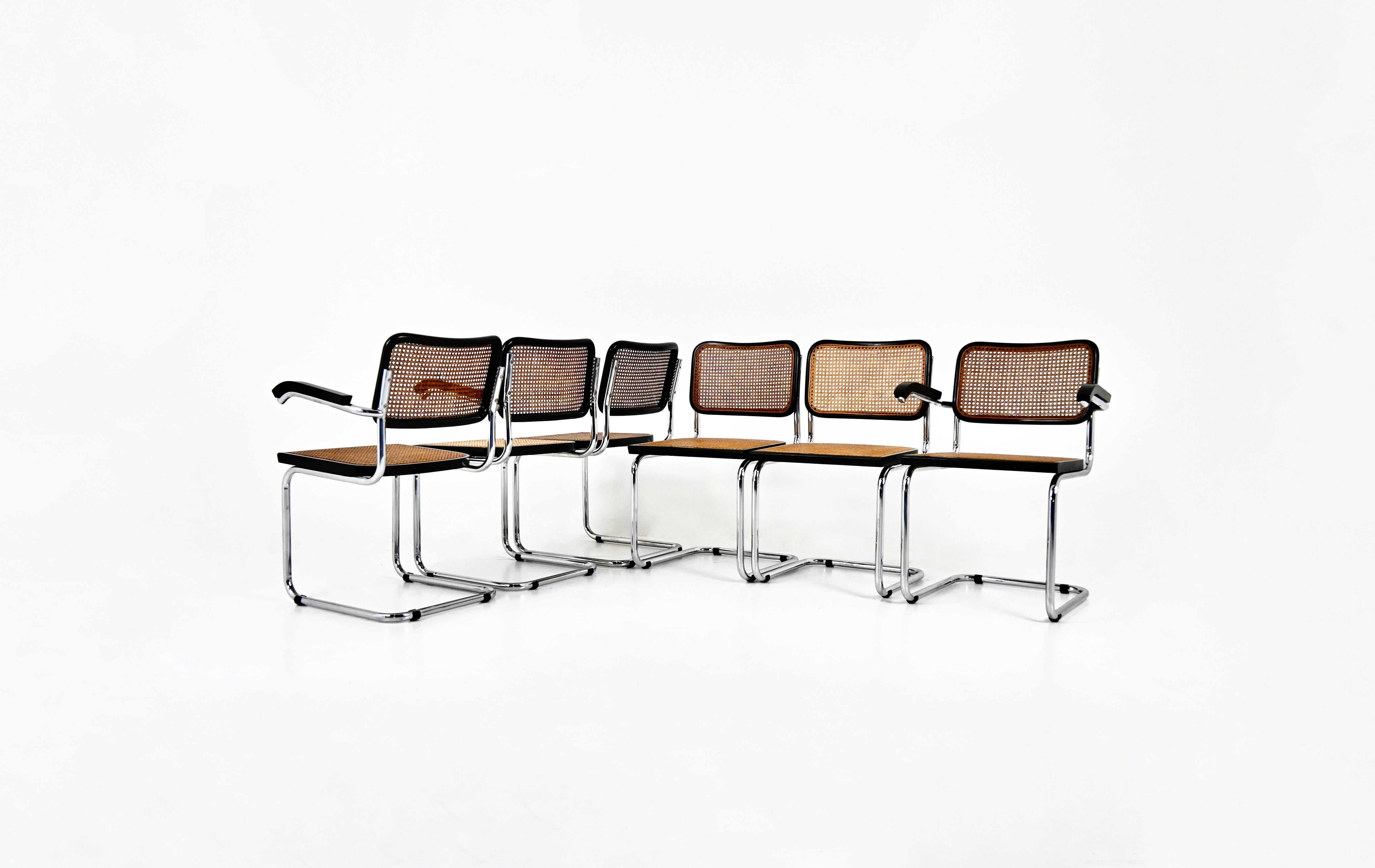 Set di 4 sedie in  metallo nero, legno e rattan. 
Dimensioni: altezza della seduta: 45 cm. Larghezza con braccioli: 60 cm 
Usura dovuta al tempo e all'età delle sedie. 
PER LA SPEDIZIONE, RICHIEDICI DI RICEVERE IL MIGLIOR PREZZO



